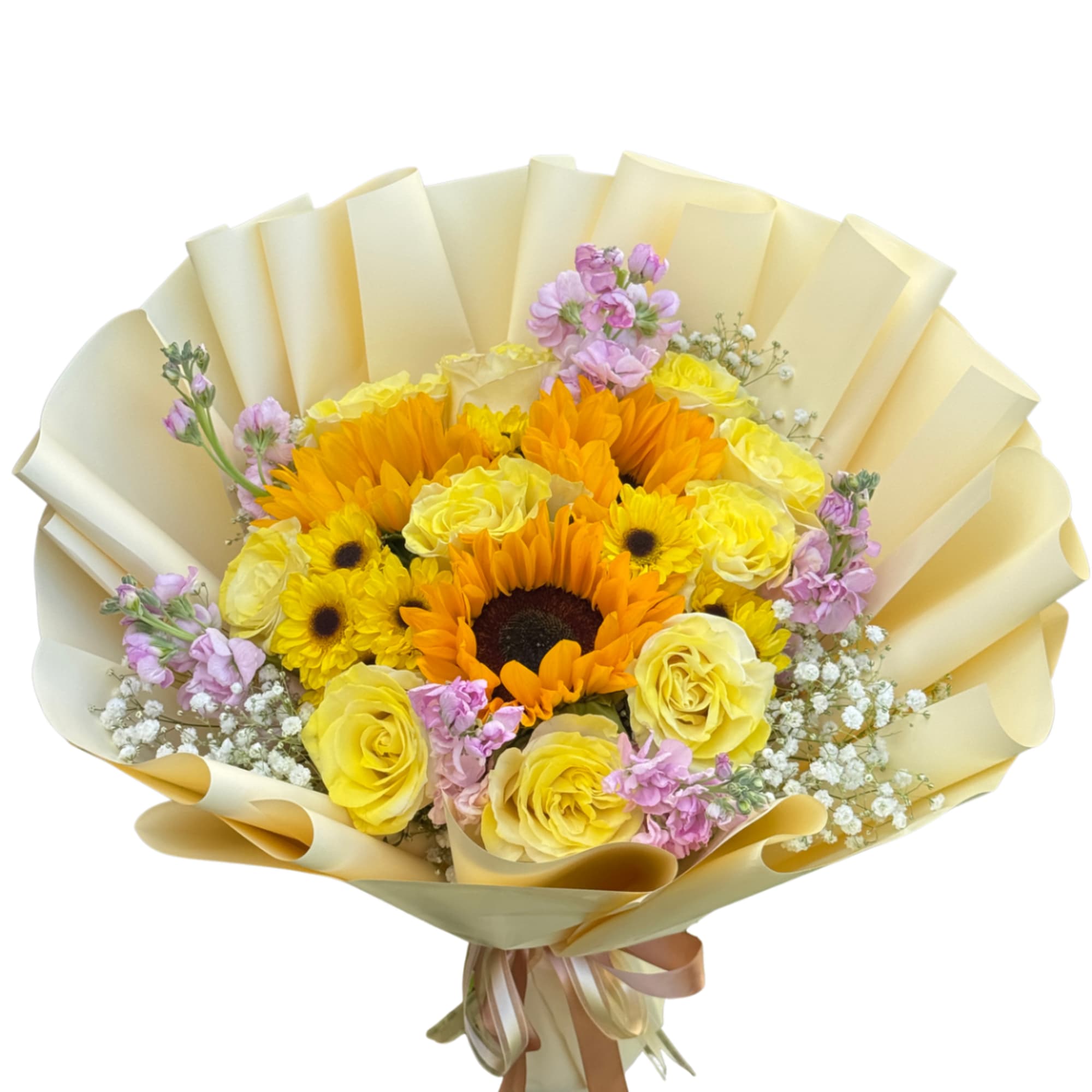 Bouquet of yellow roses, sunflowers, and pink flowers wrapped in cream paper