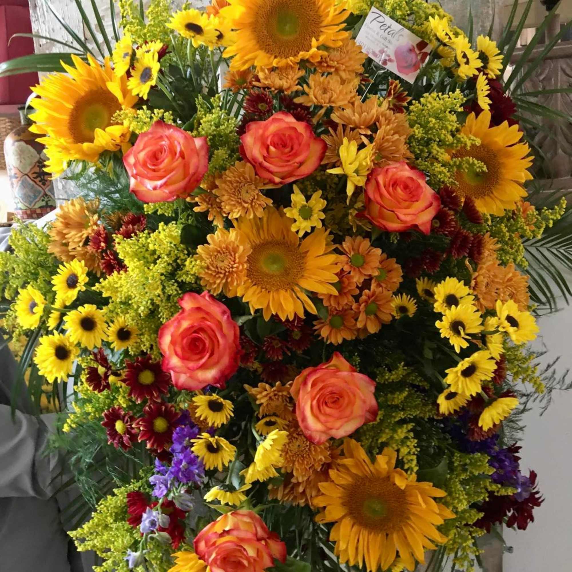 This Autumn Harvest Standing Spray is a
beautiful, showy seasonal tribute featuring a, photo 2 of 2