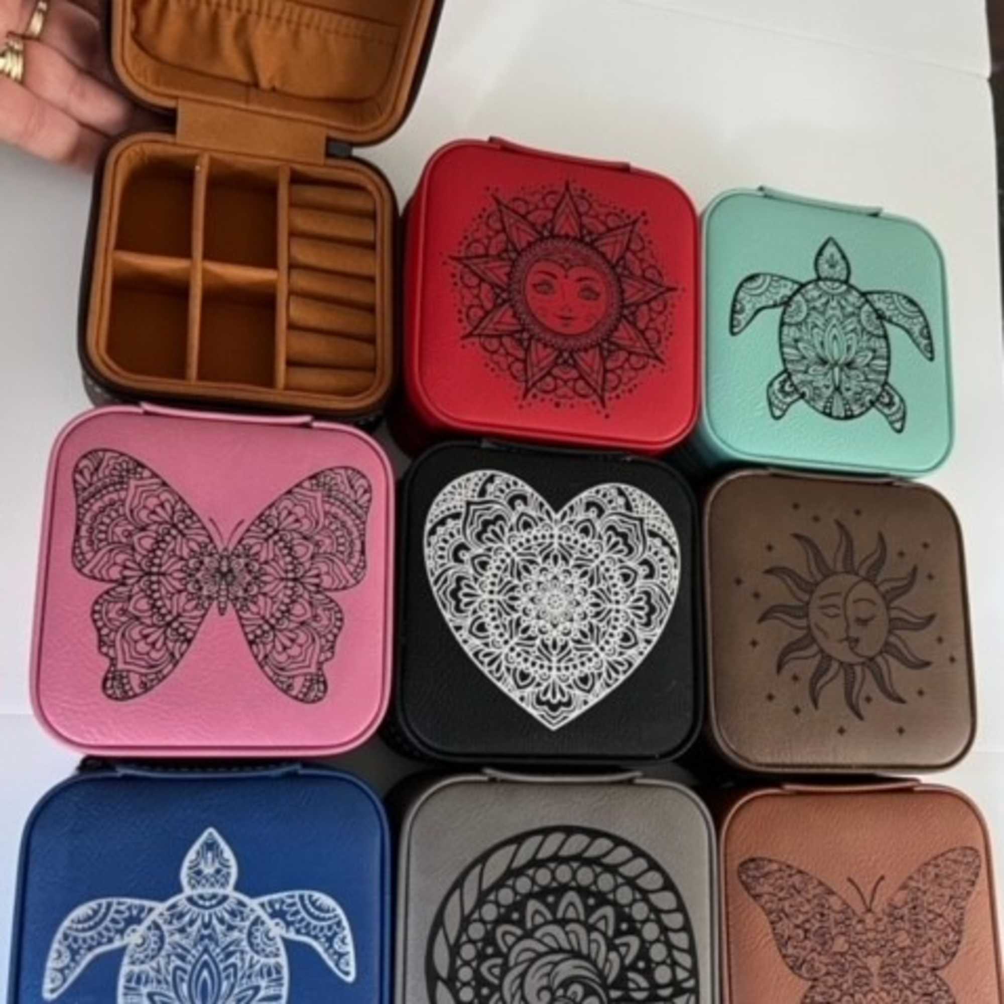 Assorted square decorative cases with mandala and animal designs