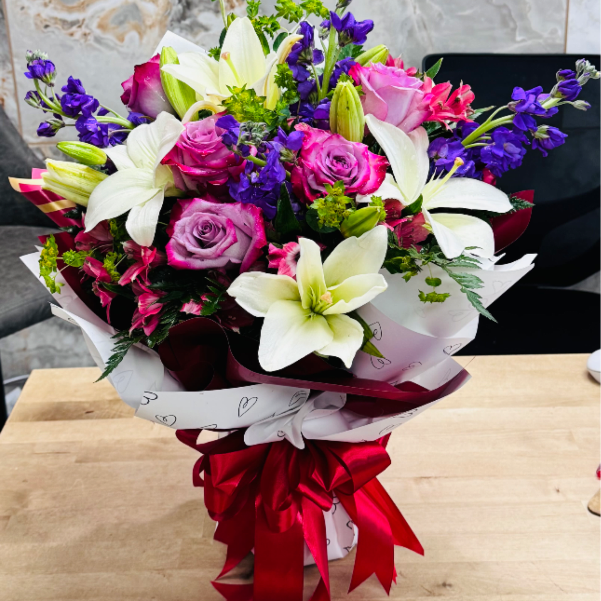 Classic romantic bouquet featuring purple roses and white lilies, accented with purple, photo 2 of 2