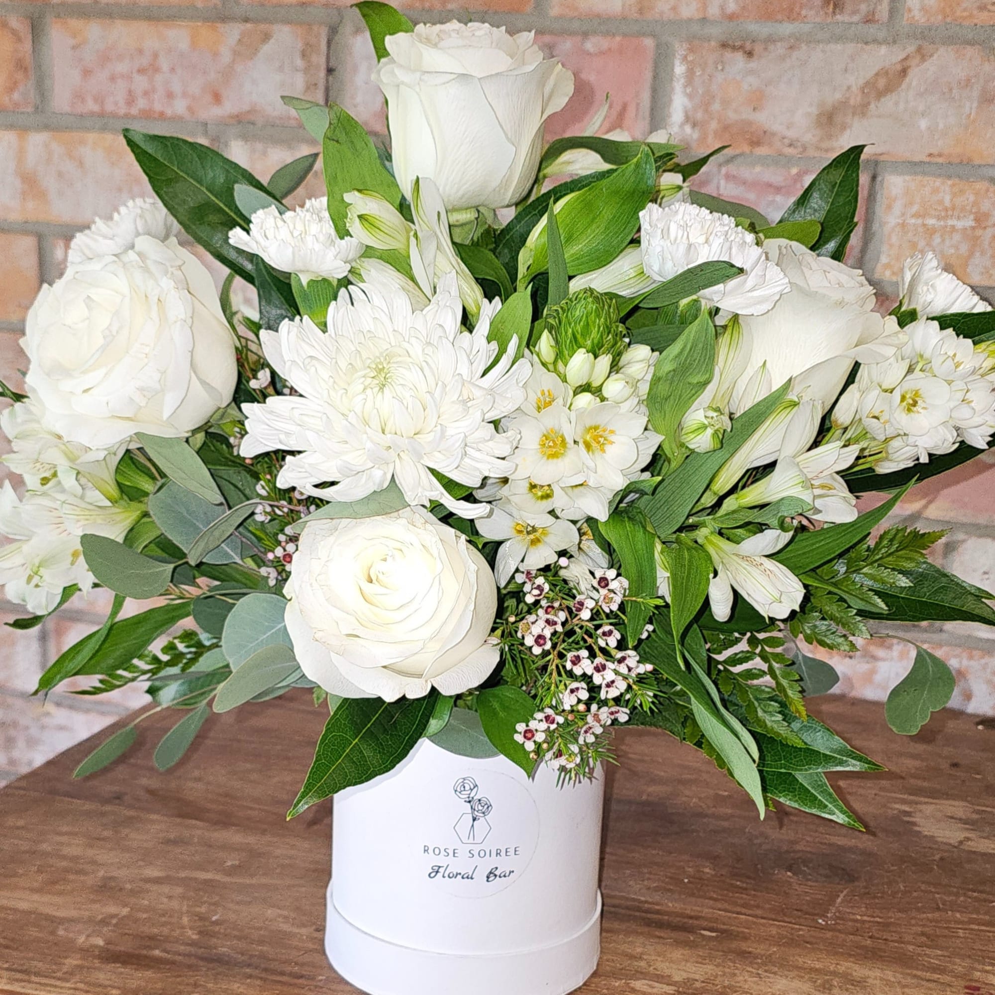 The Light of My Life Signature Box features a lush arrangement of