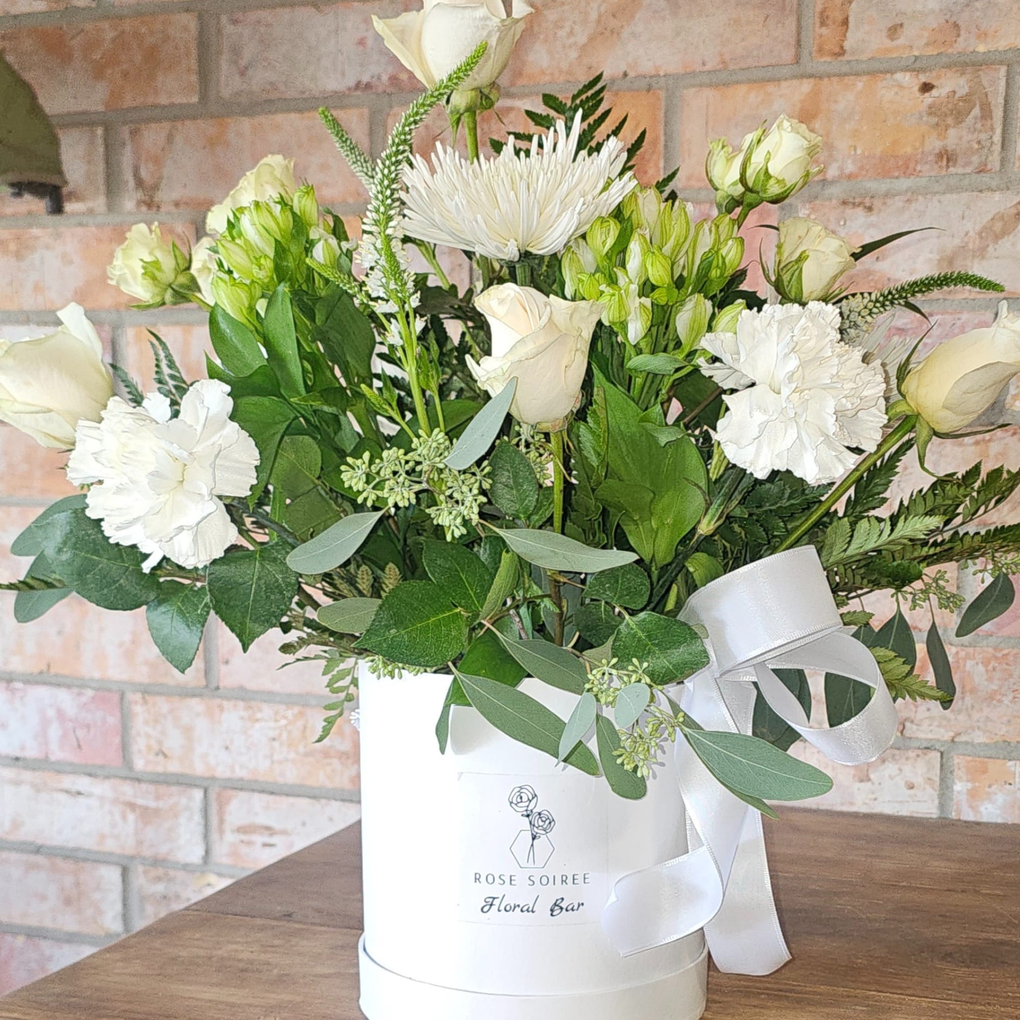 The Light of My Life Signature Box features a lush arrangement of