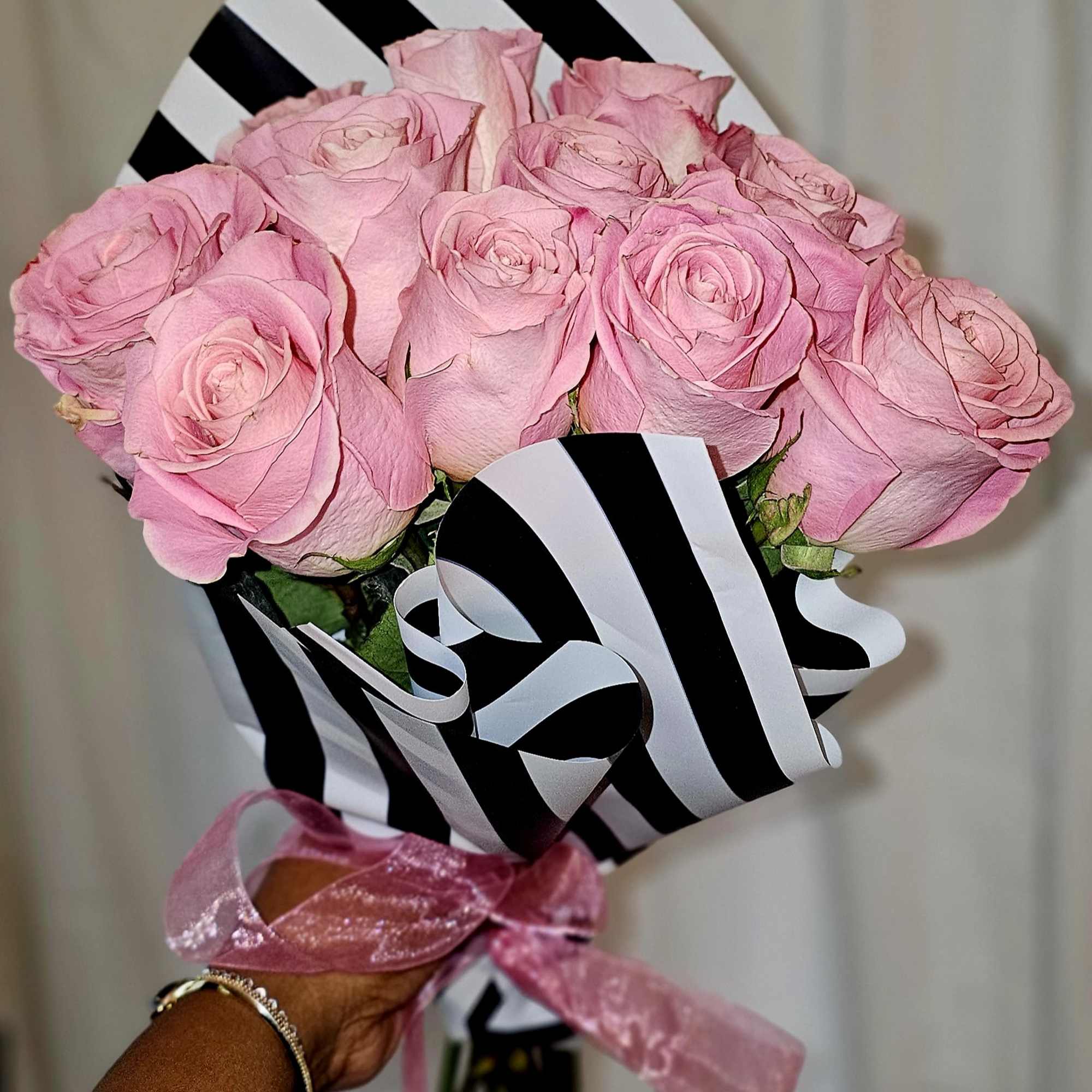 The Blush Romance Rose Bouquet features a delicate palette of blush-toned roses