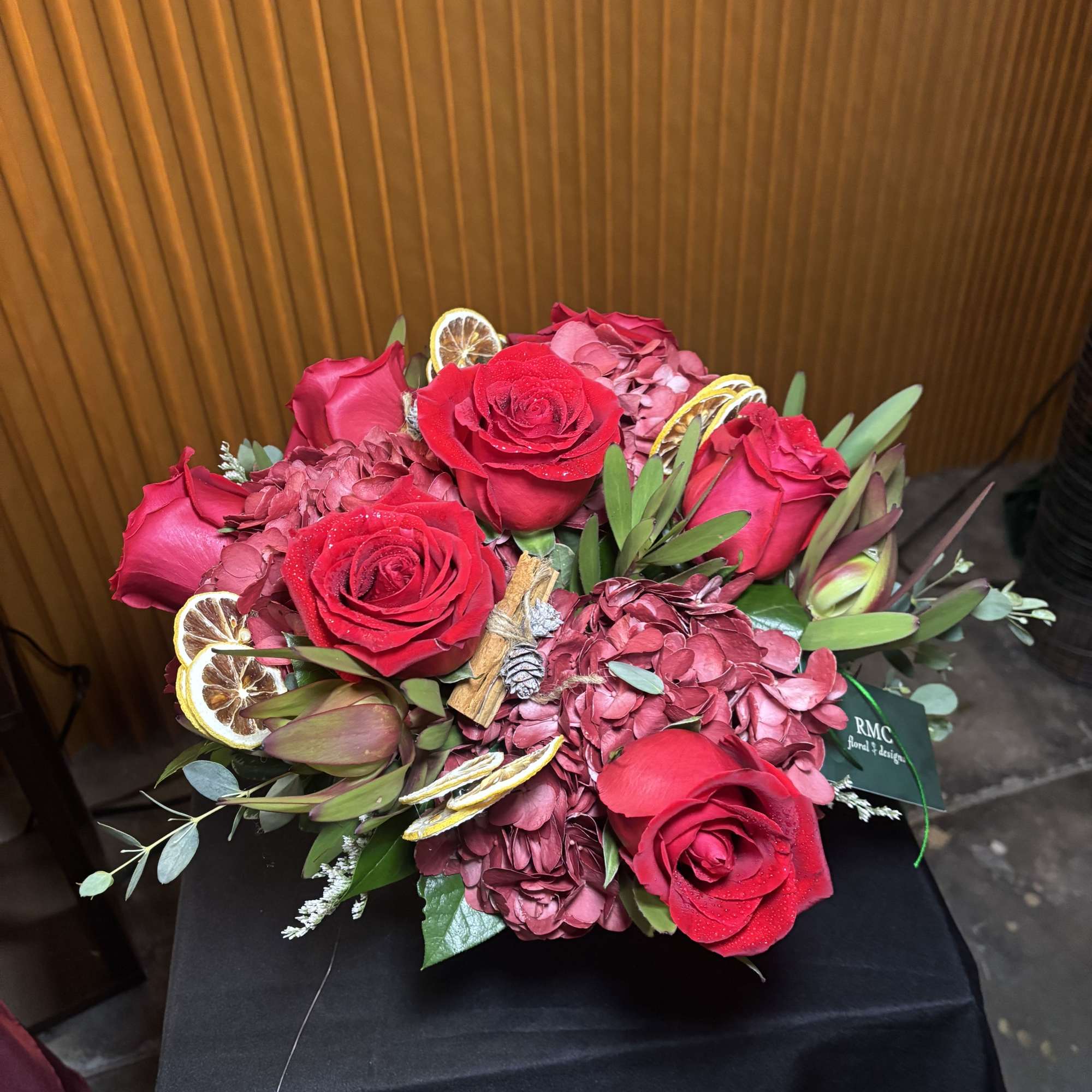 Couture Christmas is a luxury holiday floral arrangement inspired by fashion-forward design