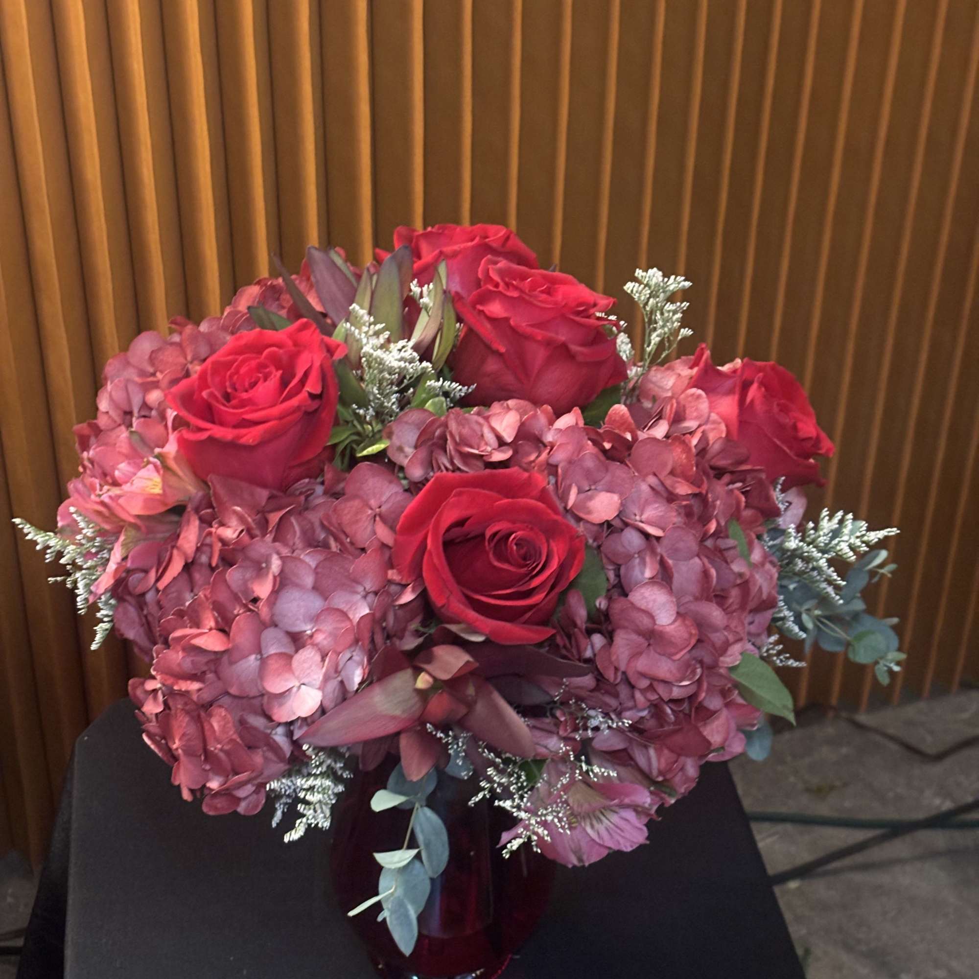 Festive Hearth is a sophisticated Christmas floral arrangement inspired by the warmth, photo 2 of 2