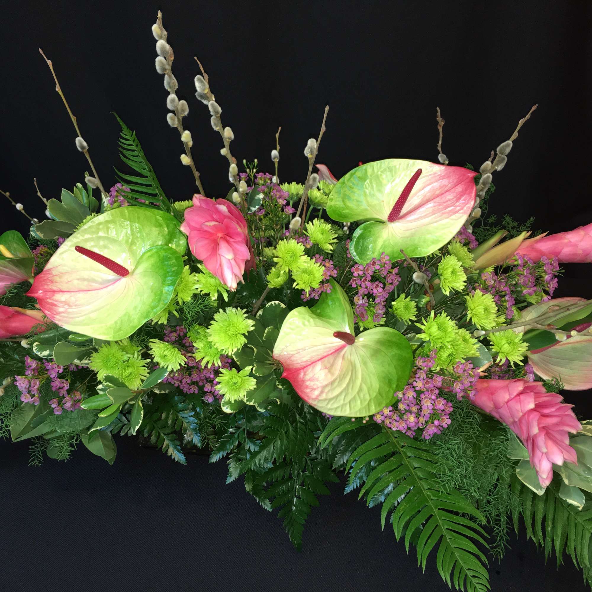 Luxurious exotic tropical flowers in a low dining table Centerpiece. Ginger, Anthurium, photo 3 of 3