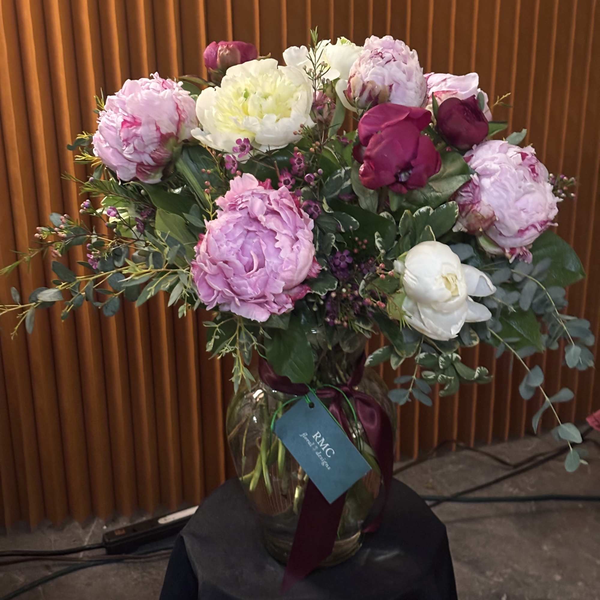 Peony Charm is a sophisticated floral arrangement that highlights the delicate beauty