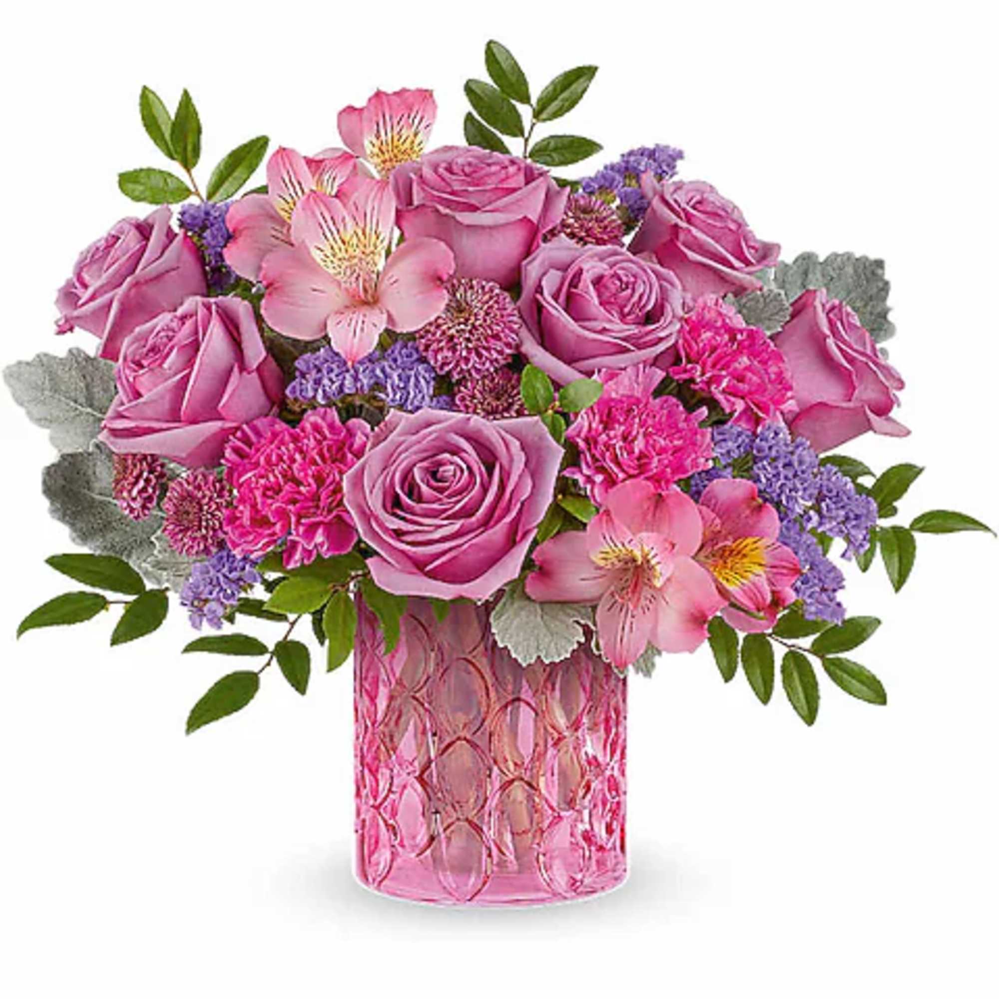Pink roses and alstroemeria in a pink glass vase