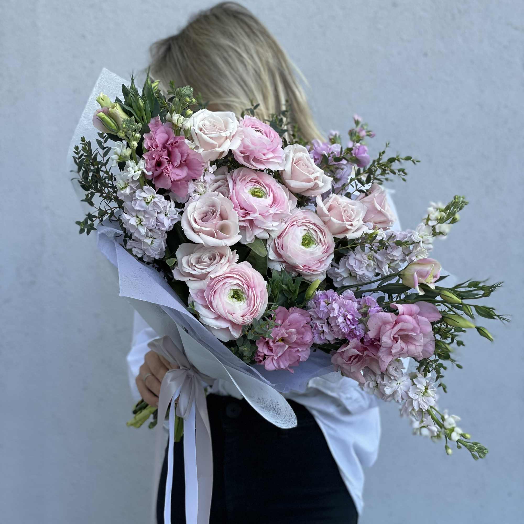 Large bouquet of pale pink and white flowers wrapped in white paper, photo 4 of 8