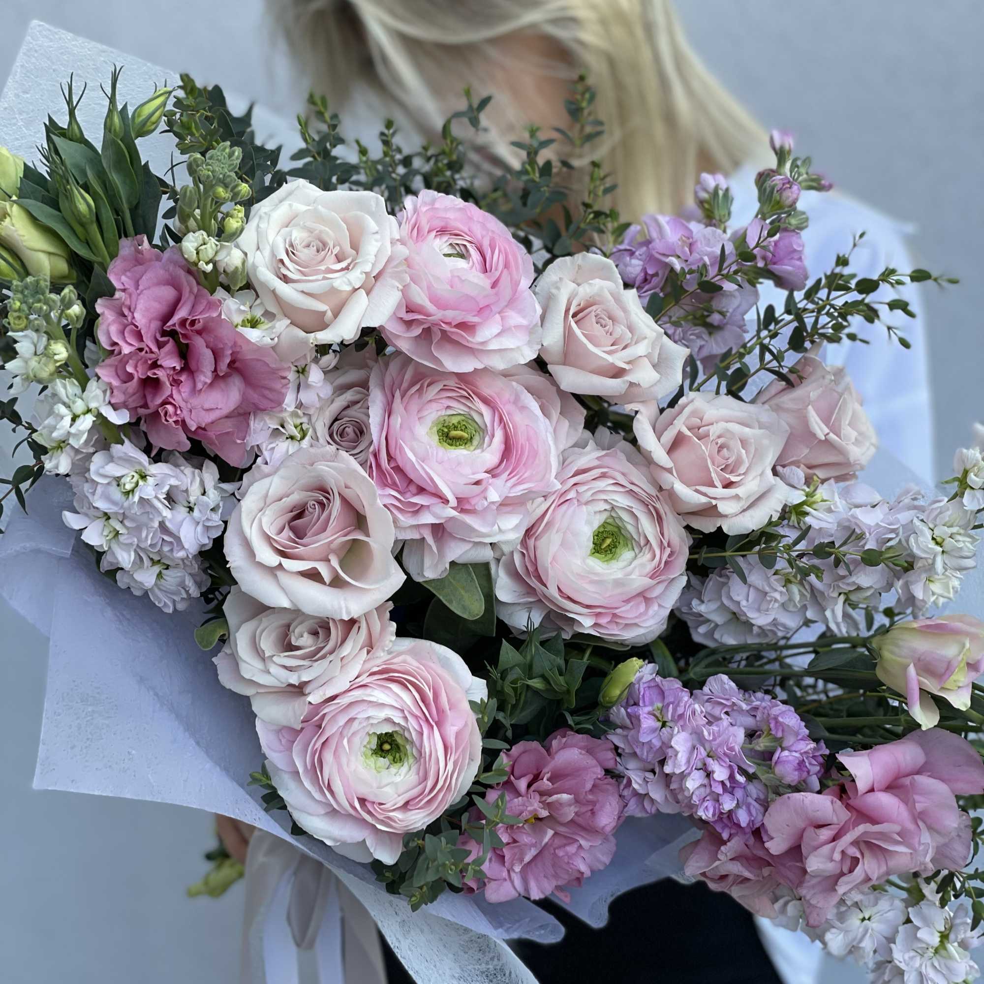 Large bouquet of pale pink and white flowers wrapped in white paper, photo 6 of 8