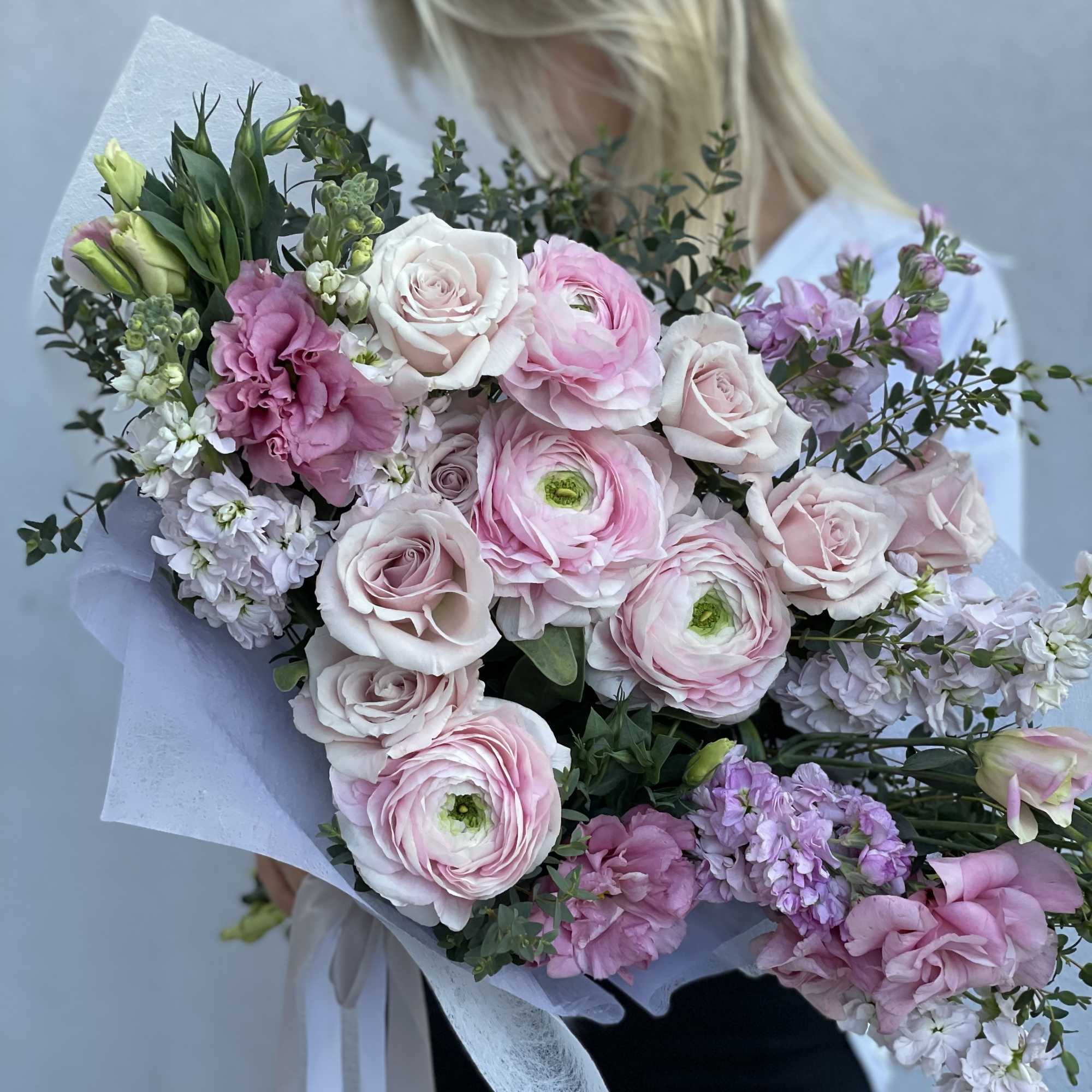 Large bouquet of pink and white flowers wrapped in pale paper, photo 8 of 8