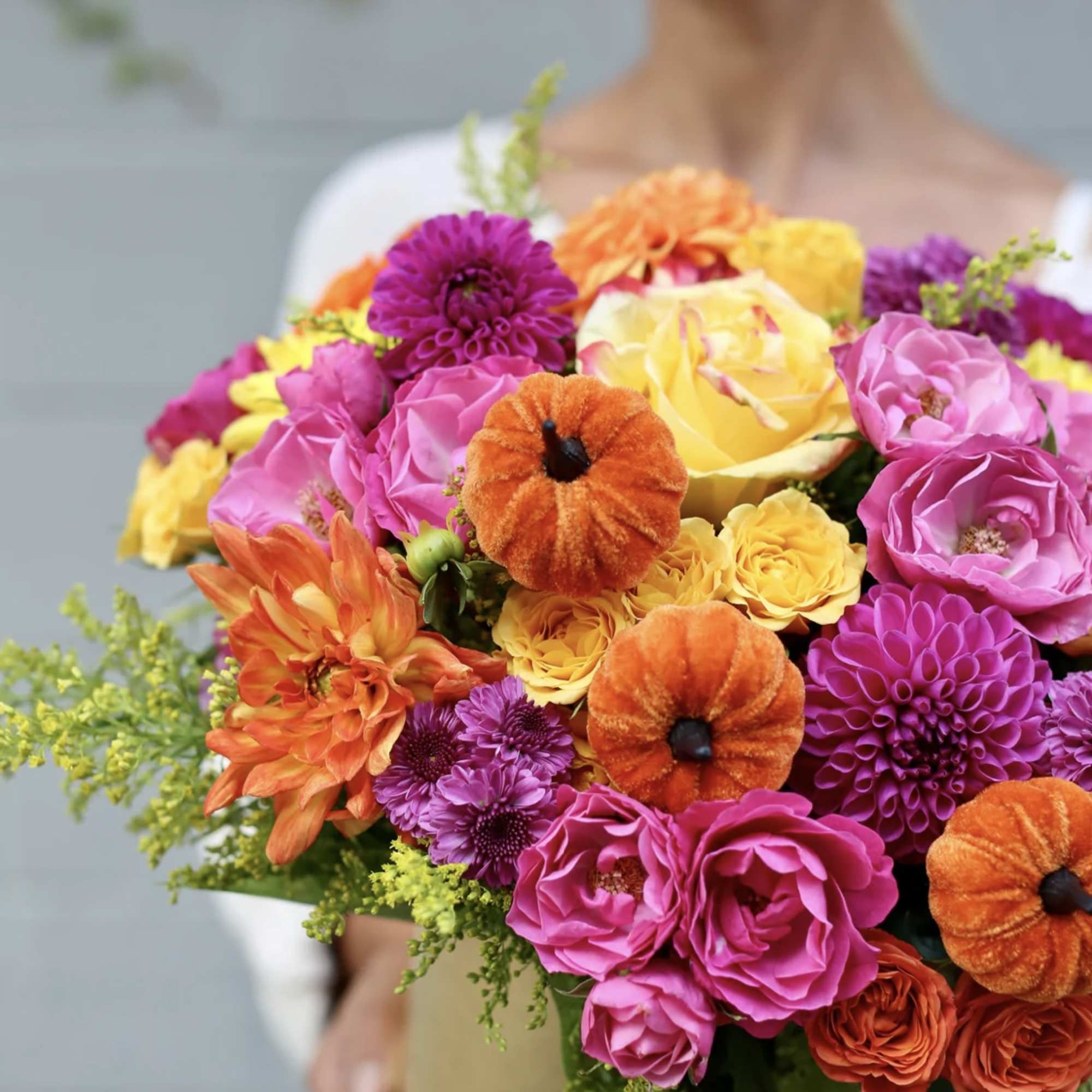 Bright mixed bouquet with pink, orange, and yellow flowers