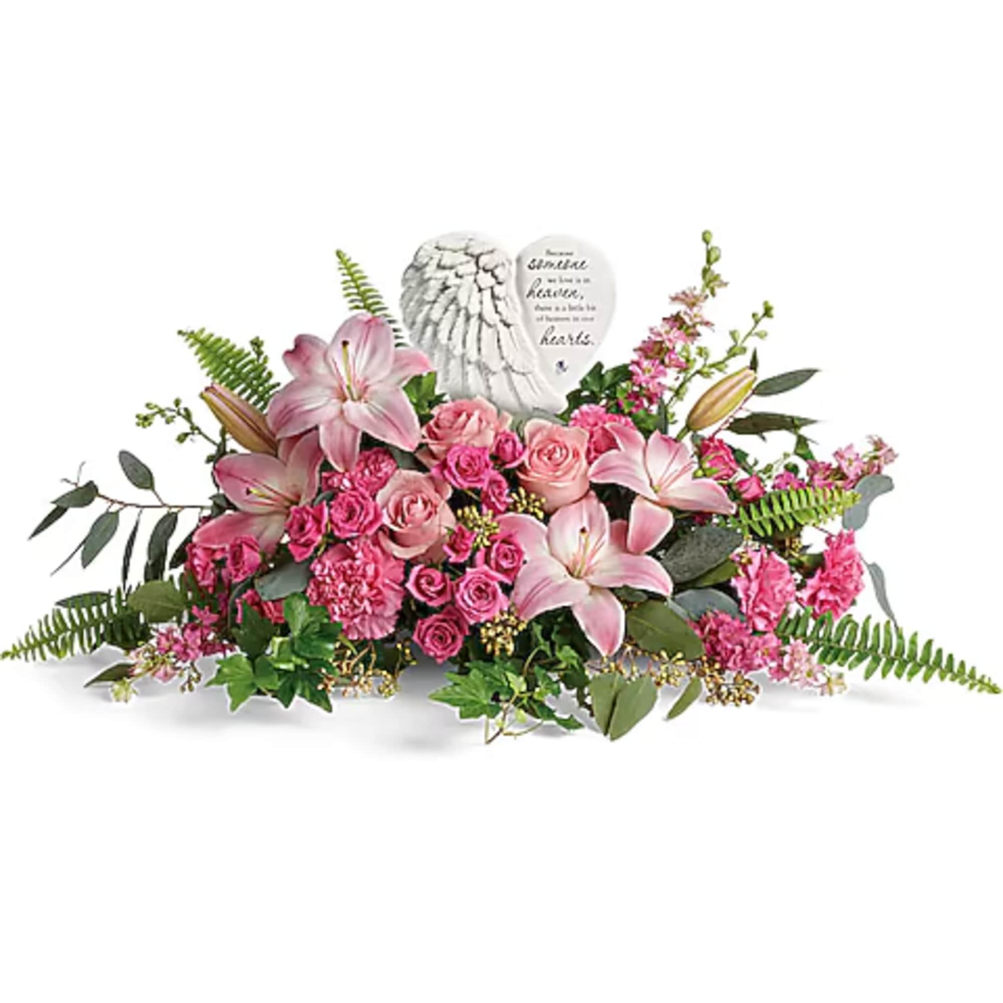 Pink floral arrangement with a heart-shaped memorial stone