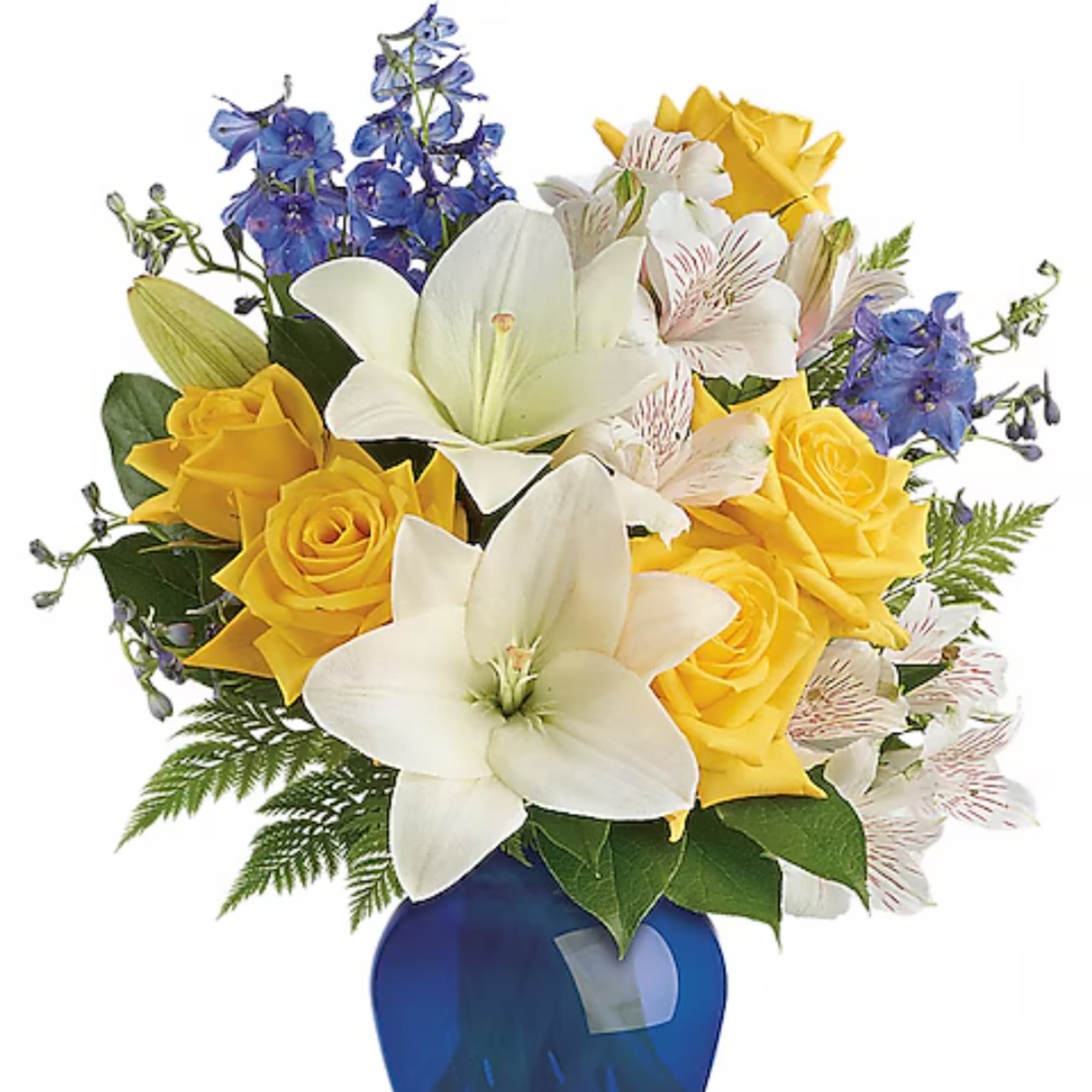 Bouquet of yellow roses, white lilies, and blue flowers in a blue vase