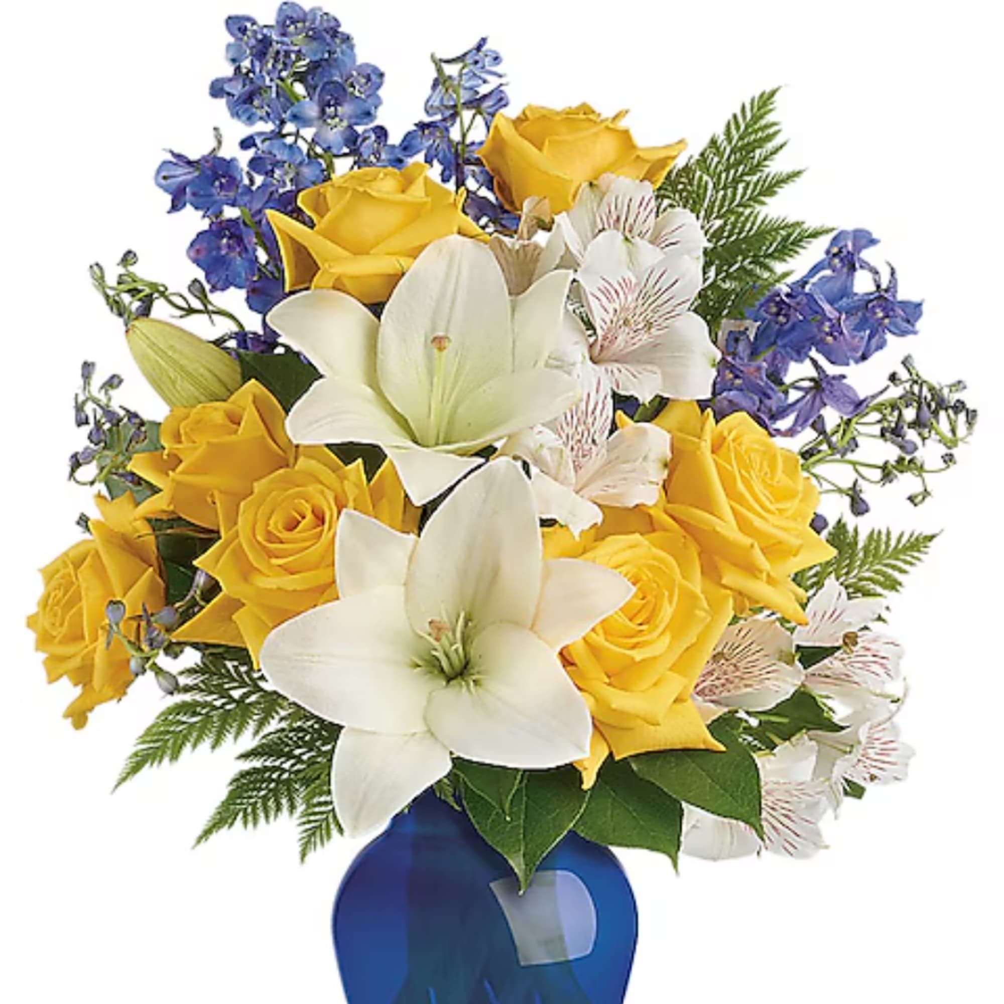 Bouquet of yellow roses, white lilies, and blue flowers in a blue vase