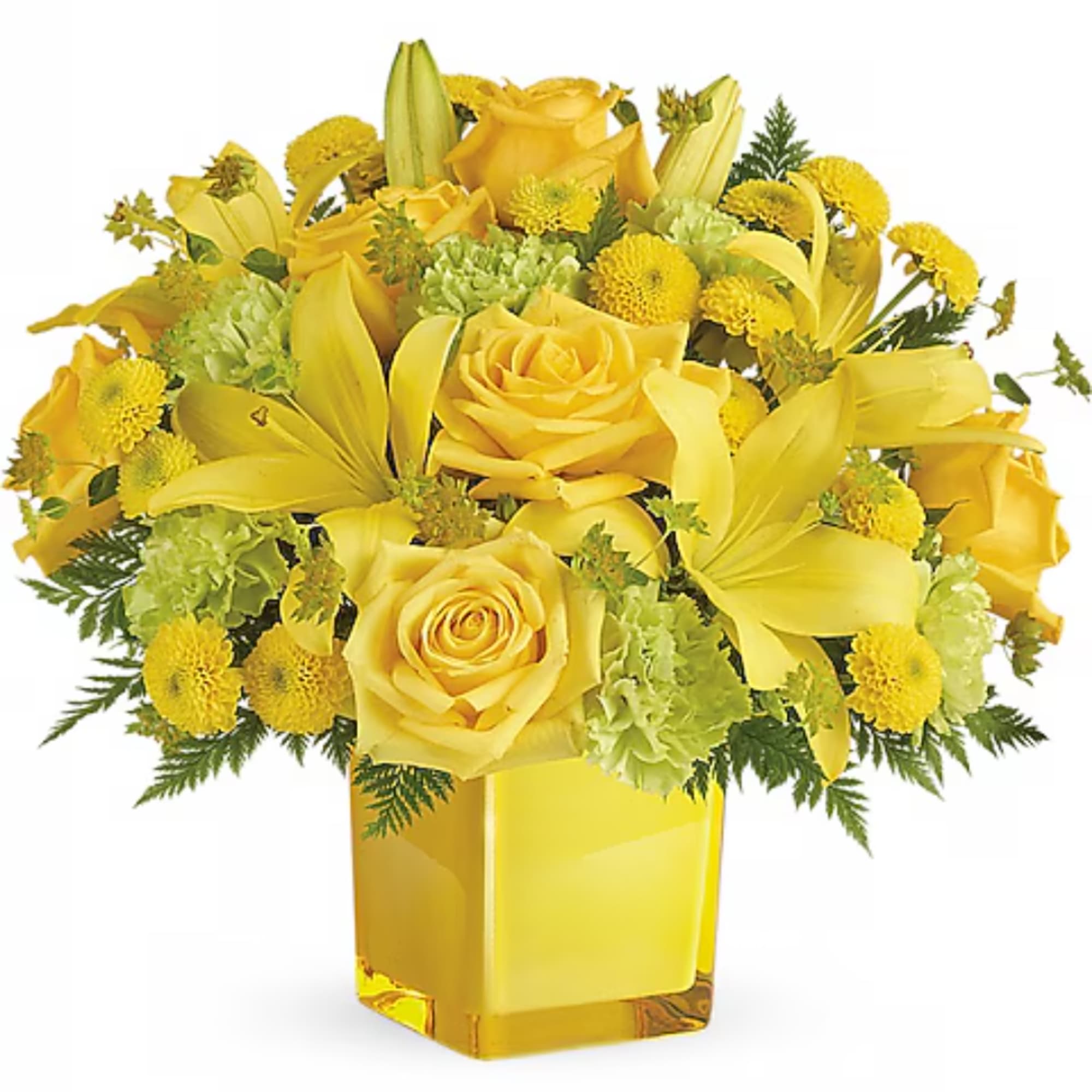 Yellow roses and lilies arranged in a square glass vase
