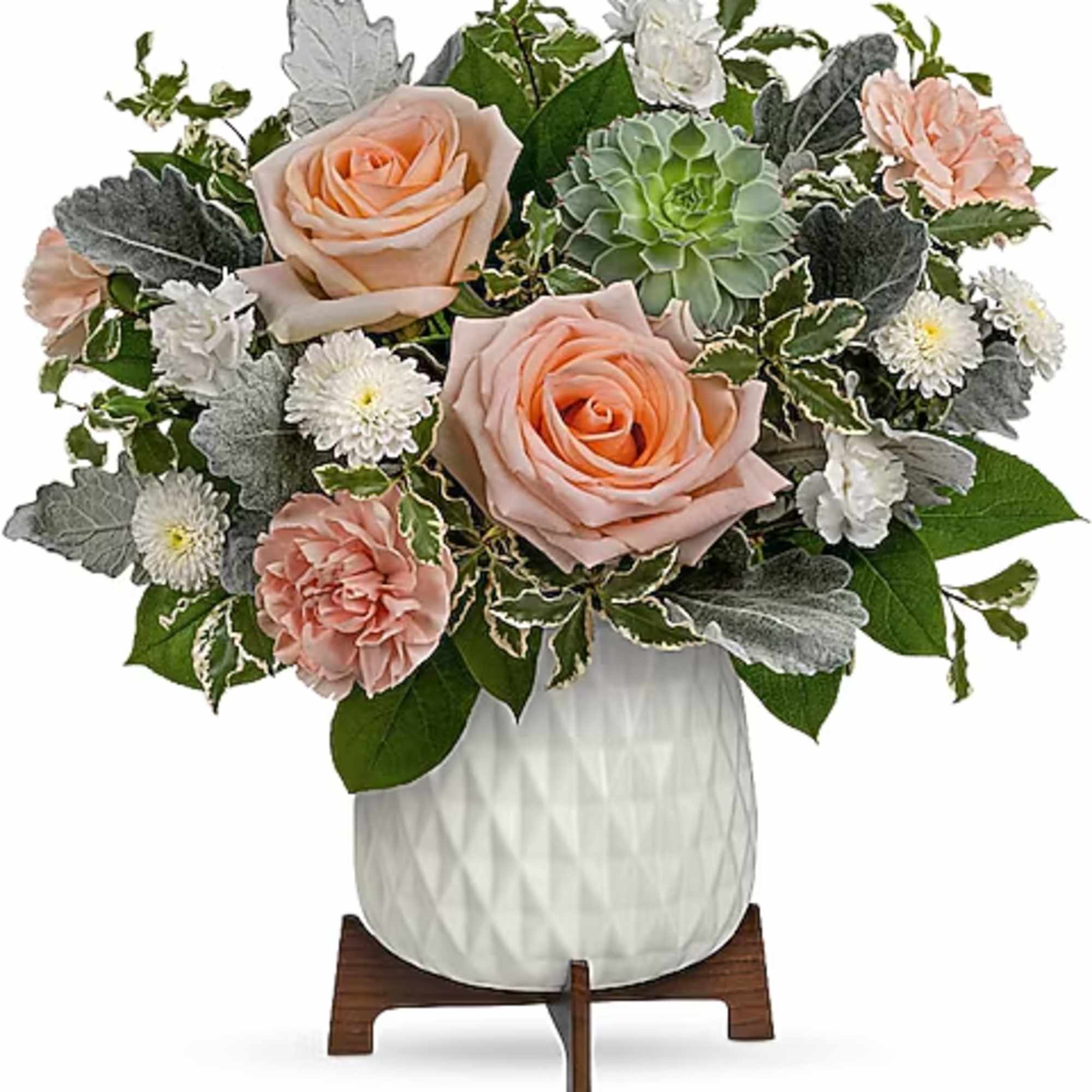 Peach roses and white daisies in a white vase with succulents