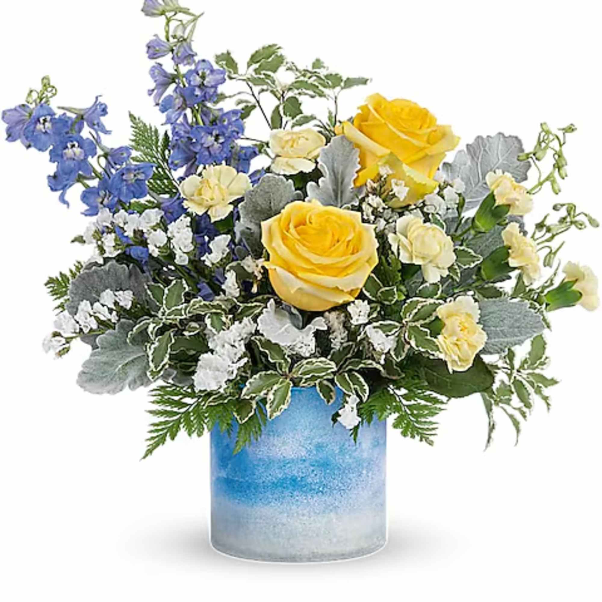 Yellow roses and blue flowers arranged in a blue glass vase