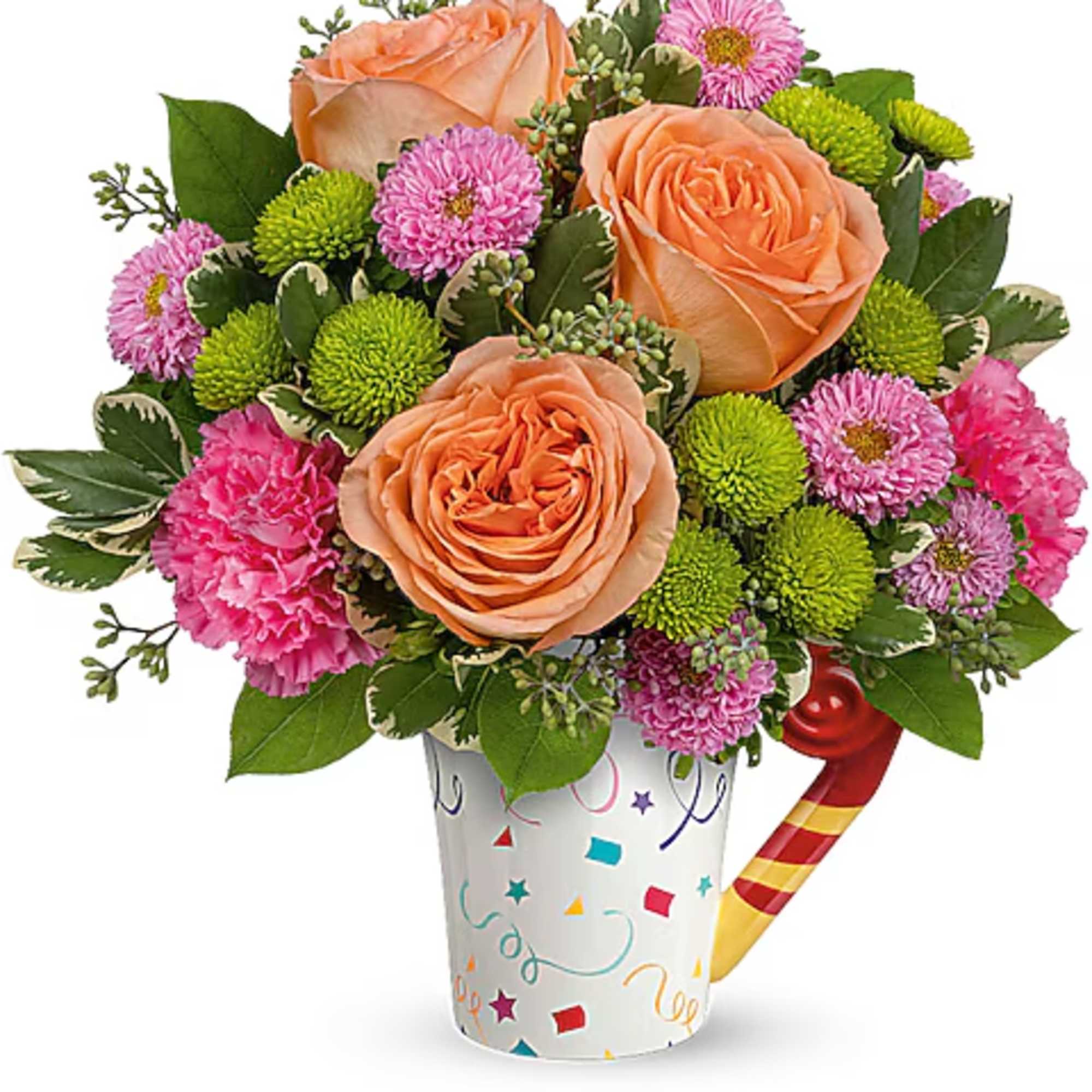 Peach roses and pink pom flowers in a festive printed mug