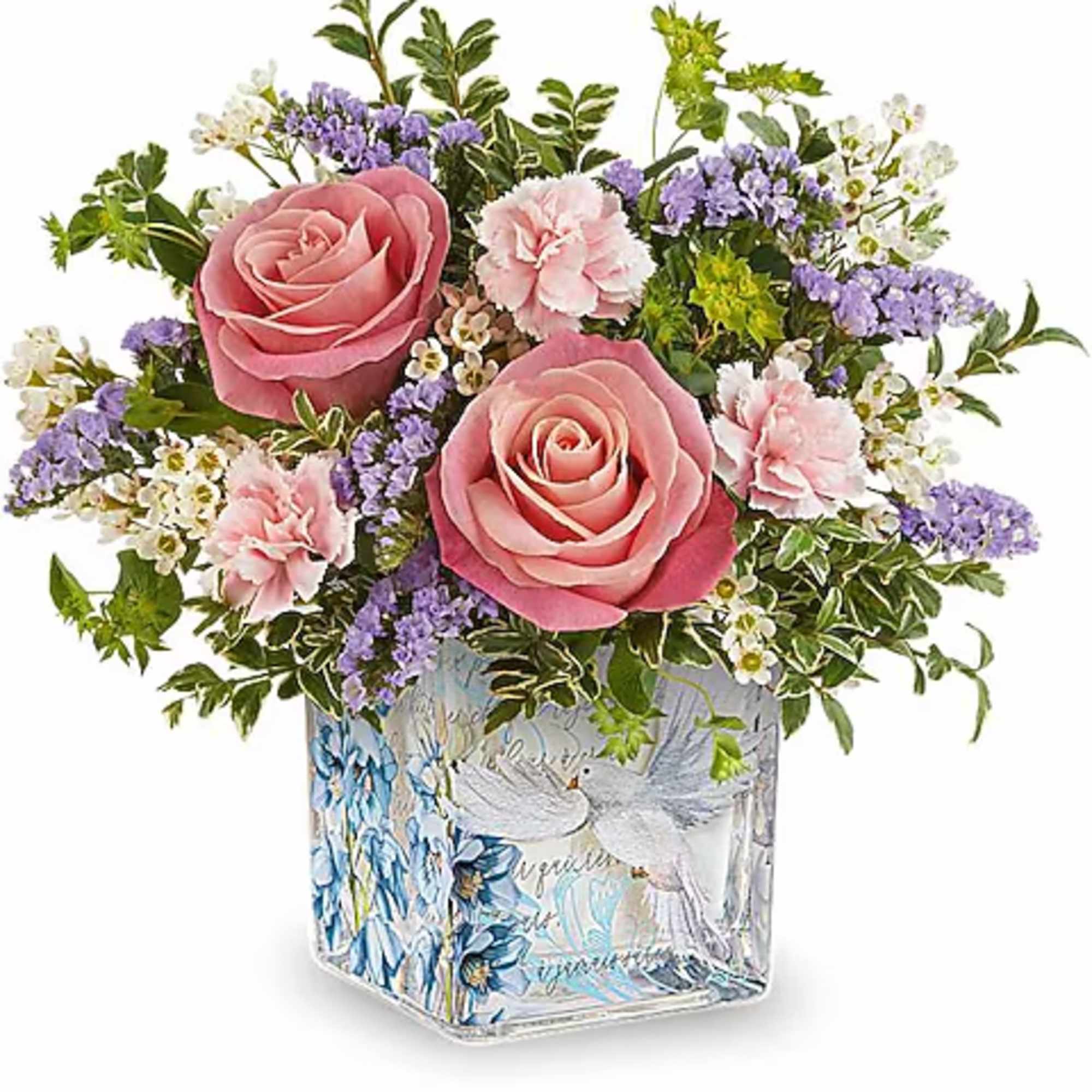 Pink roses and carnations in a decorated glass vase