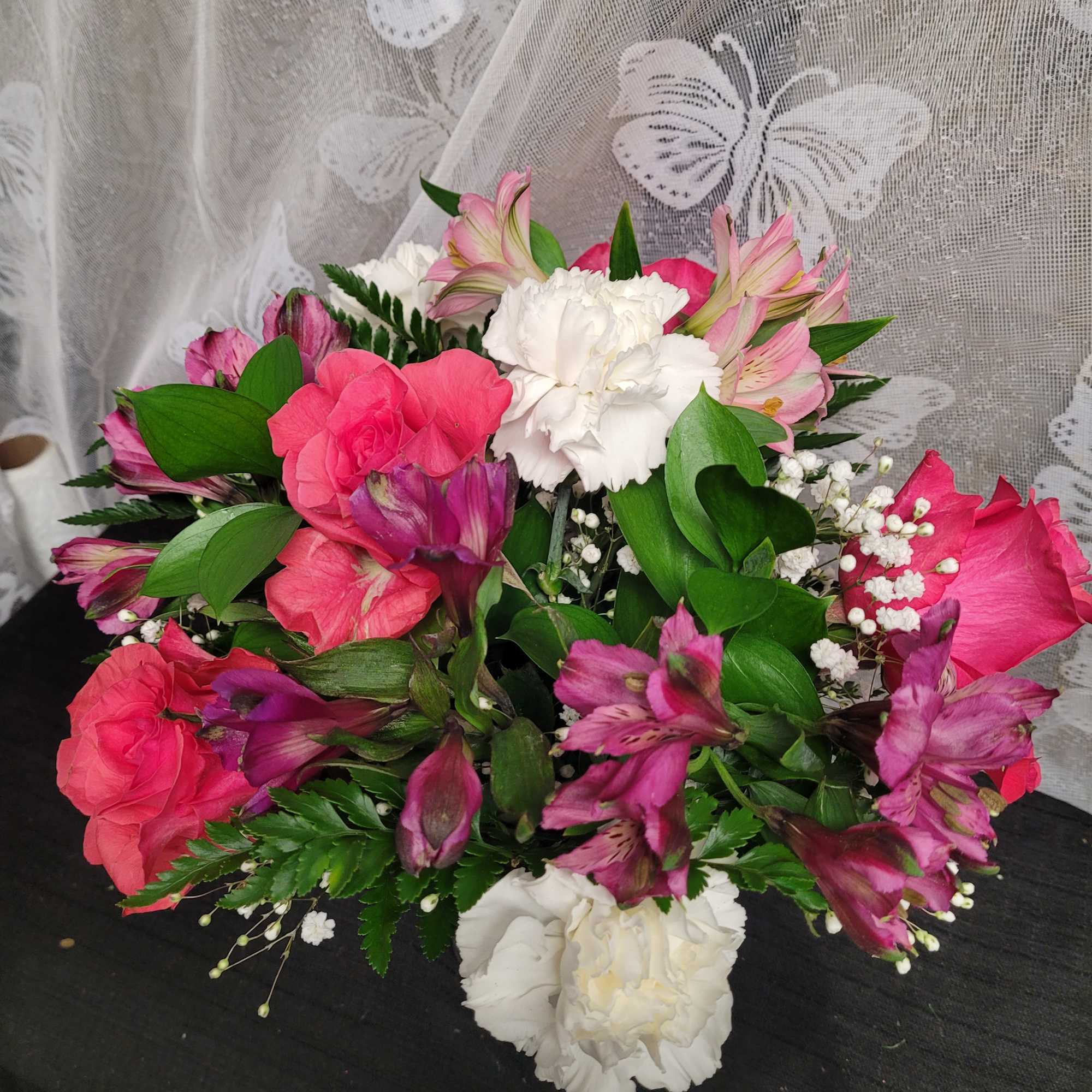 Pink and white mixed bouquet with roses, carnations, and alstroemeria