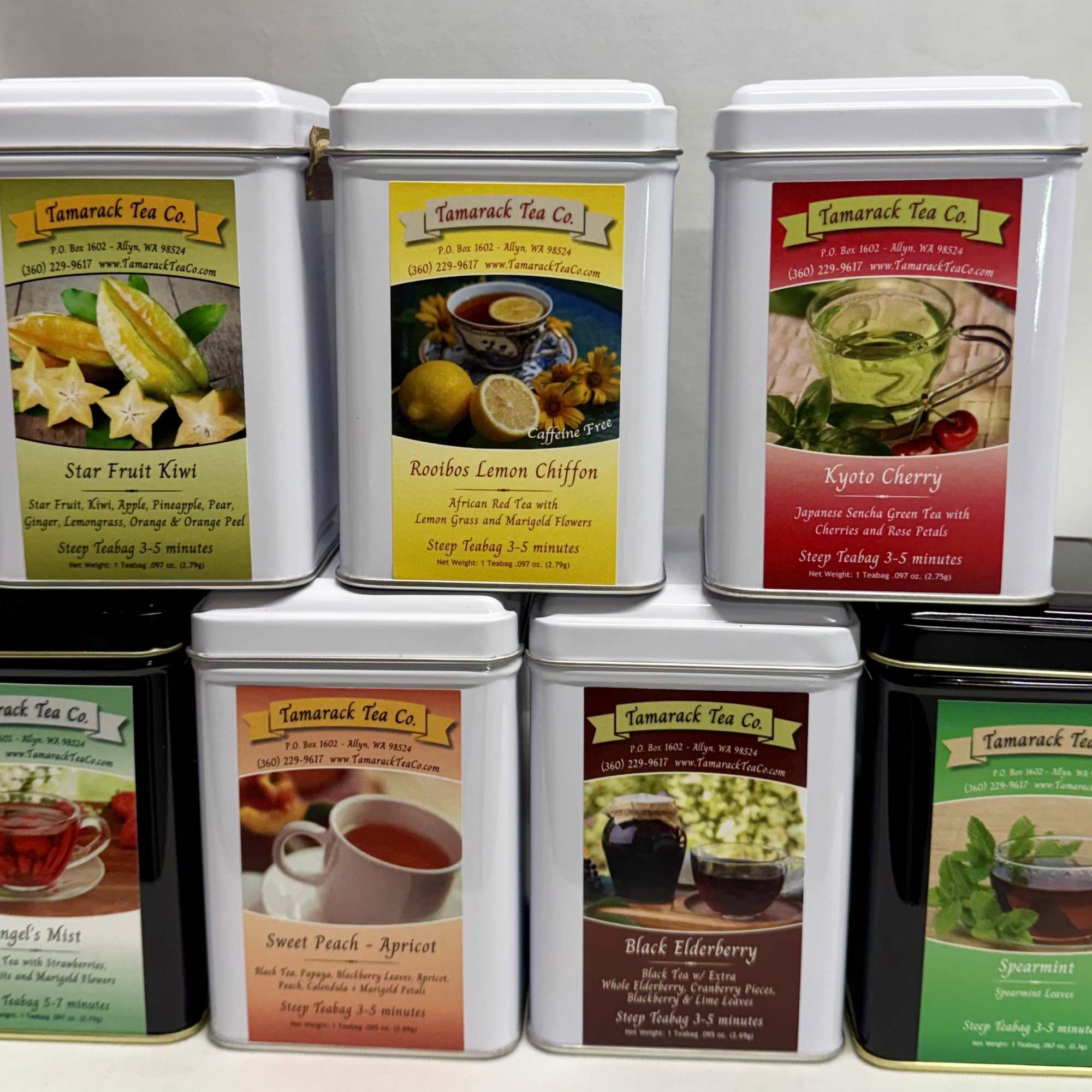 Assorted Tamarack Tea Co. tea tins stacked in two rows