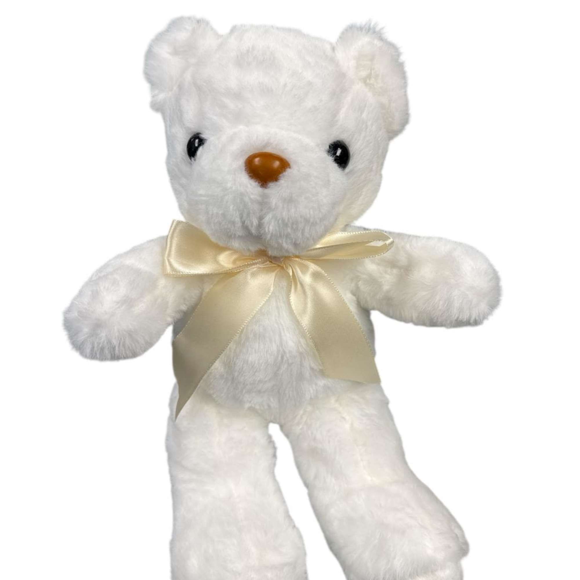 White teddy bear with a cream ribbon bow