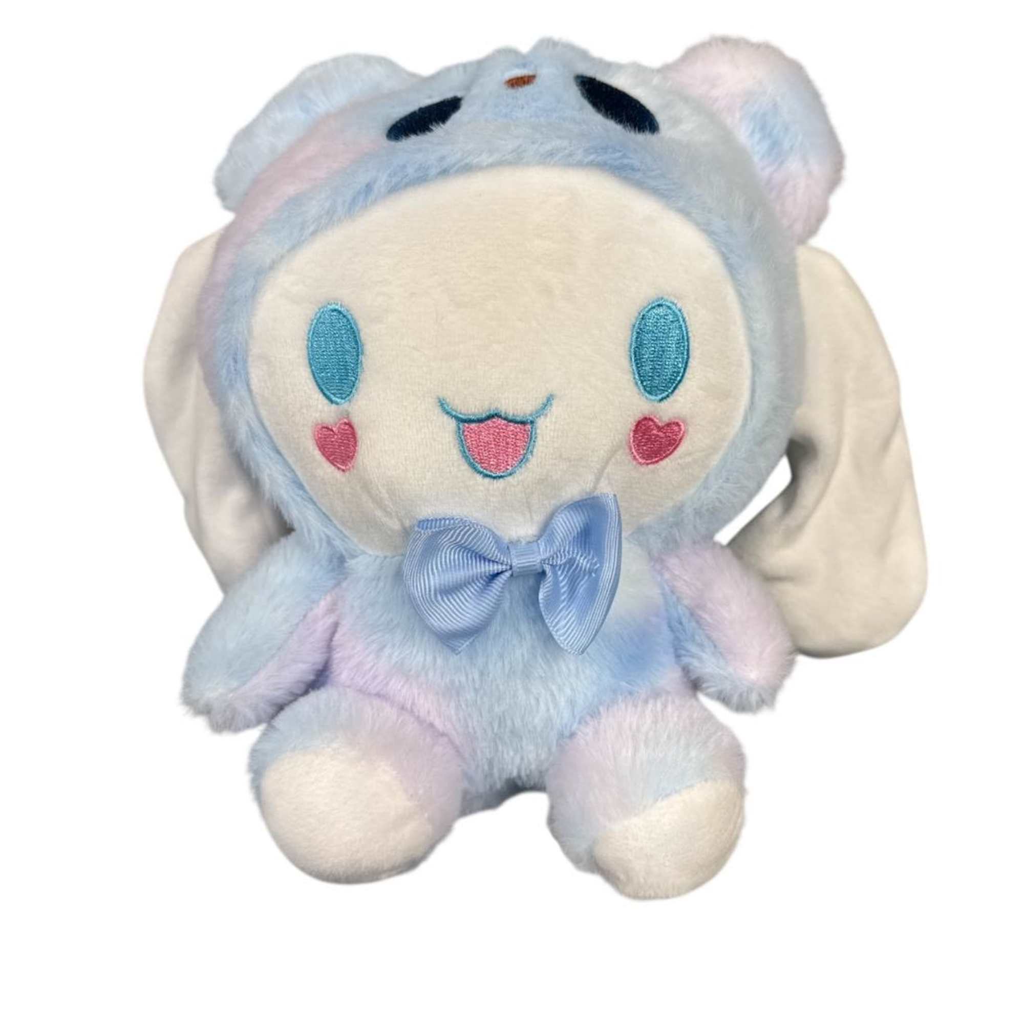 Pastel plush bunny with a blue bow and embroidered face