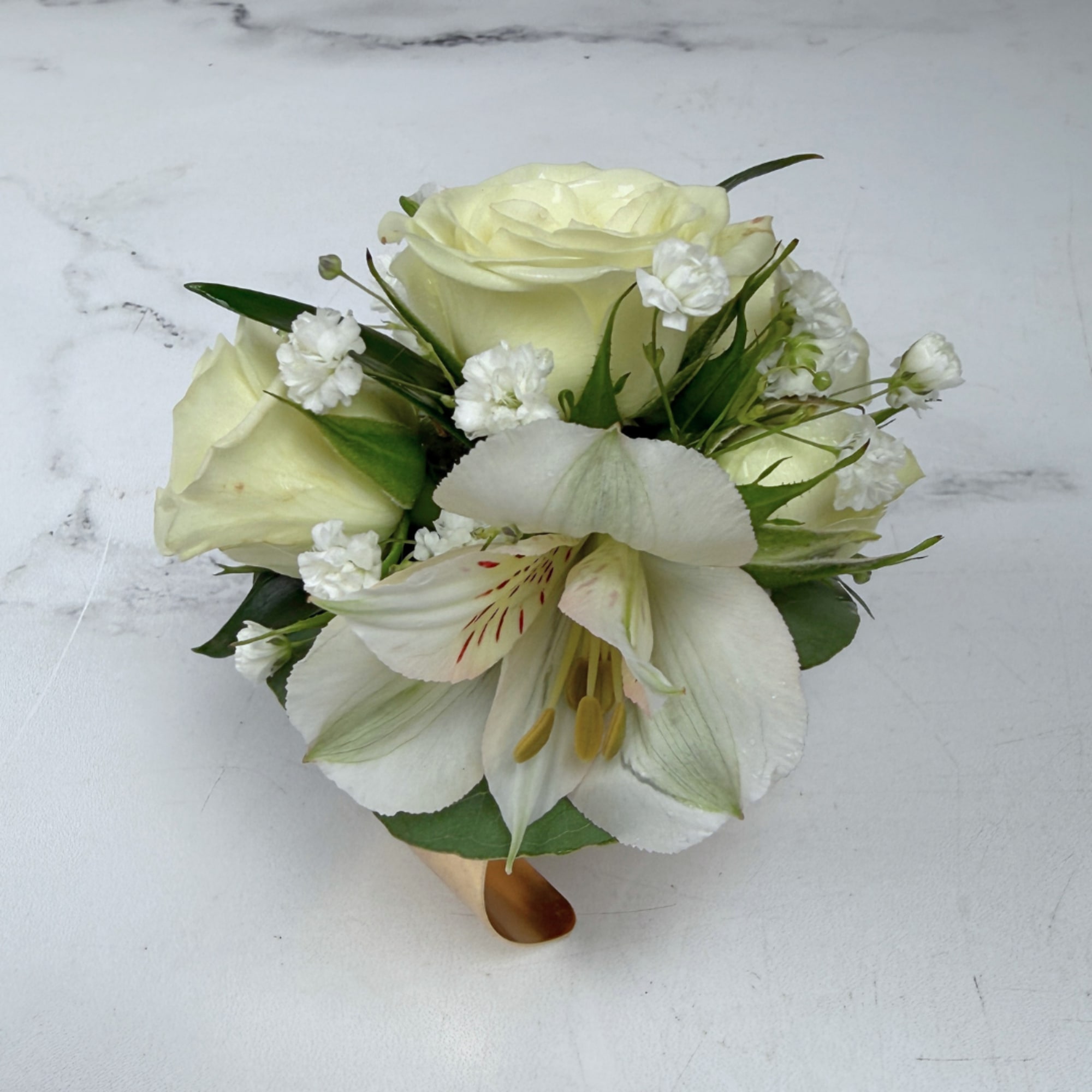 The Elegant Ivory Corsage features four white/ivory spray roses and two alstroemeria, photo 4 of 4