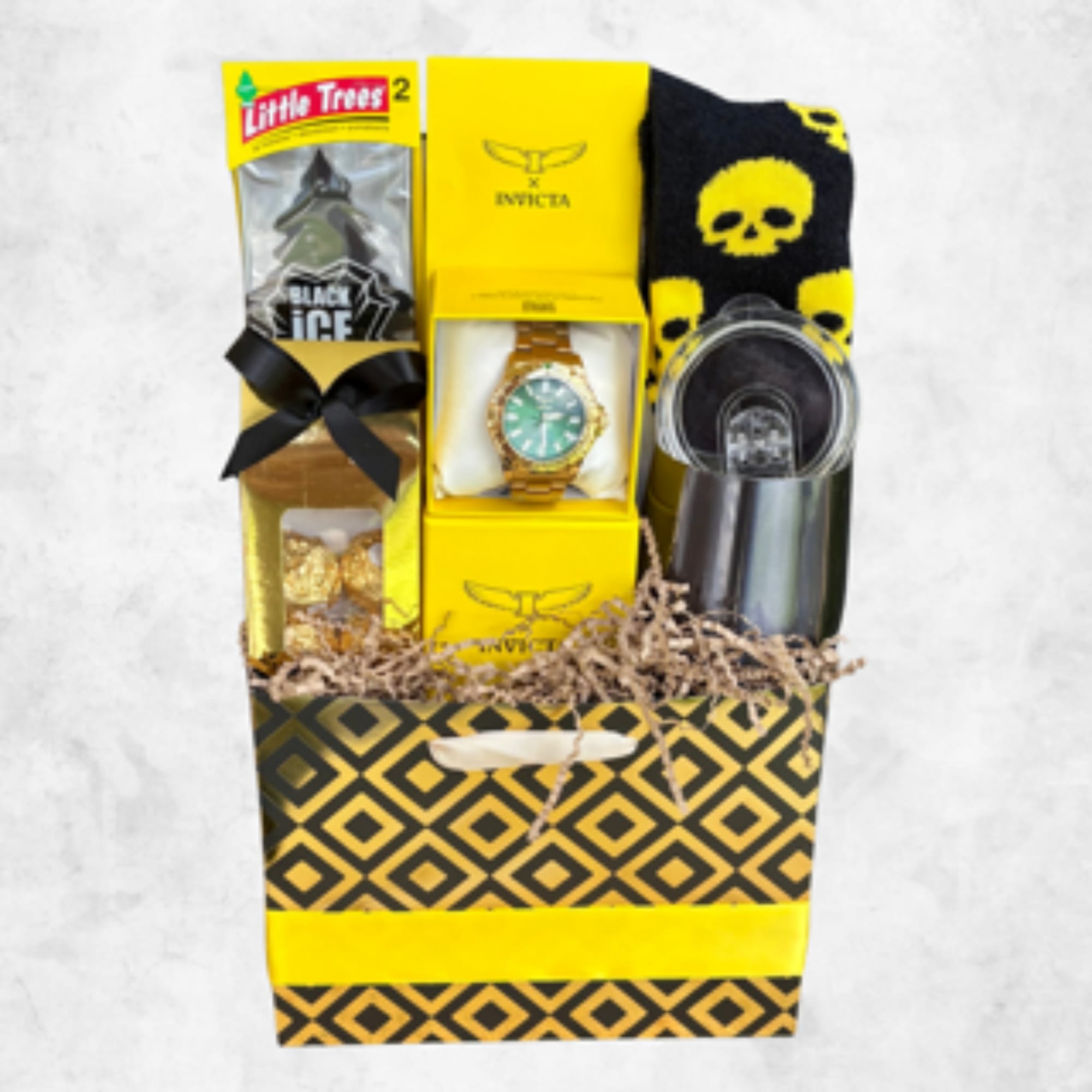 Gift basket with a watch, socks, candy, and a tumbler