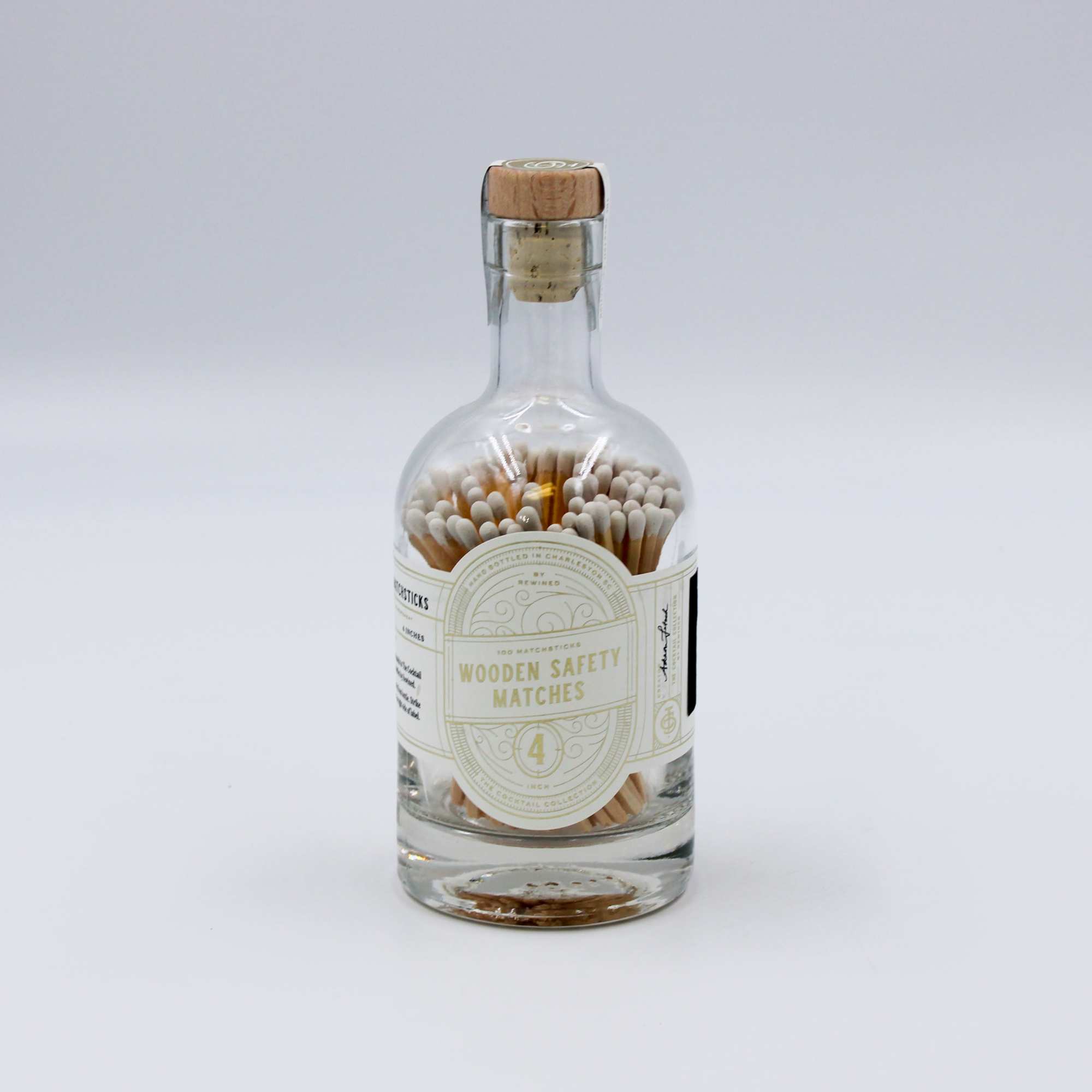 Glass bottle filled with wooden safety matches