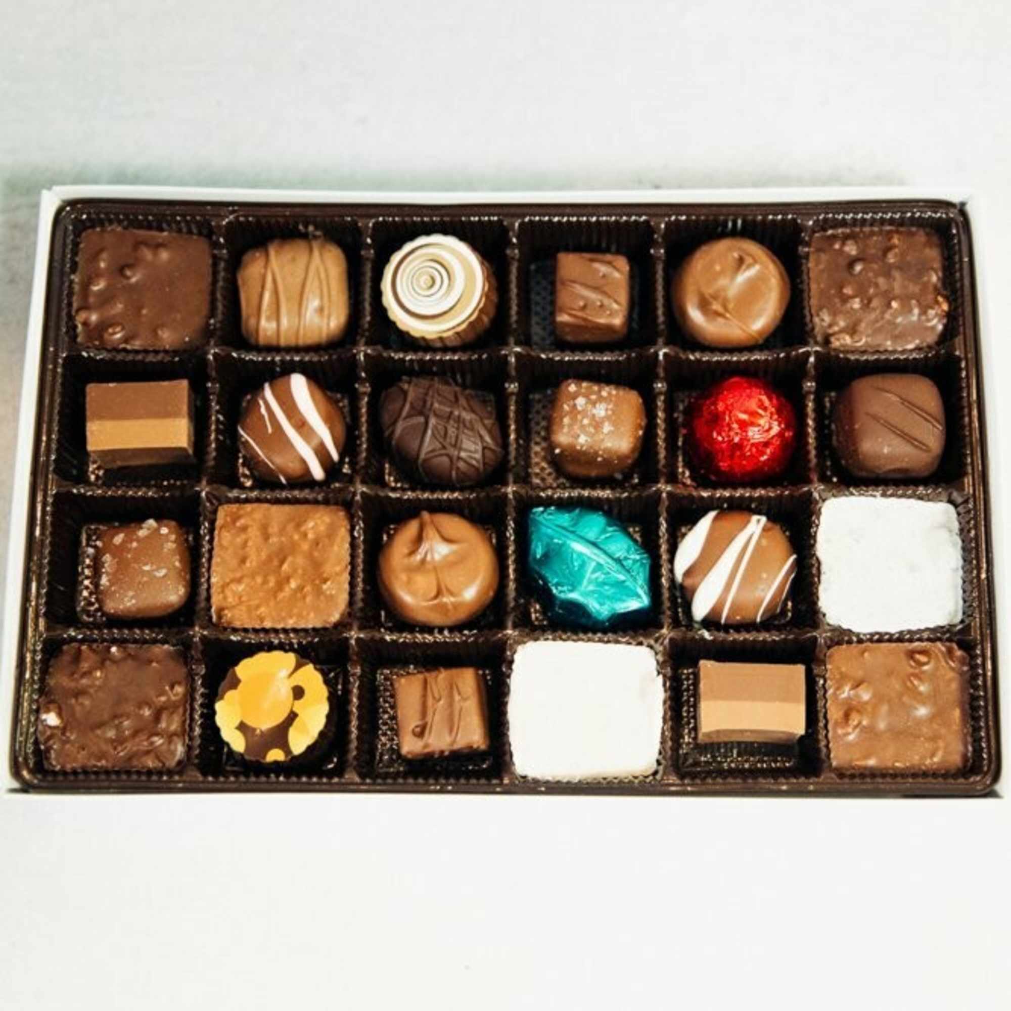 Assorted chocolates arranged in a rectangular gift box