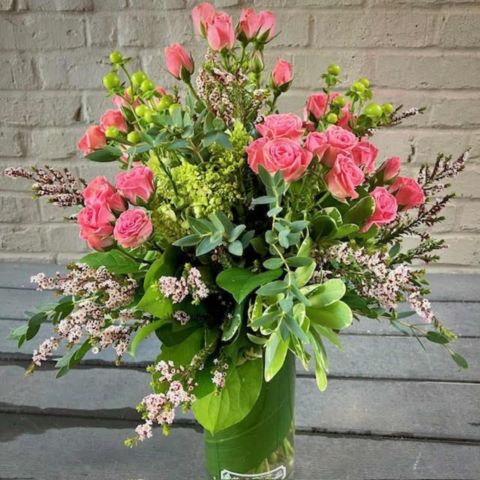 This lovely bouquet features a beautiful combination of Sweetheart Roses, Hydrangeas, and