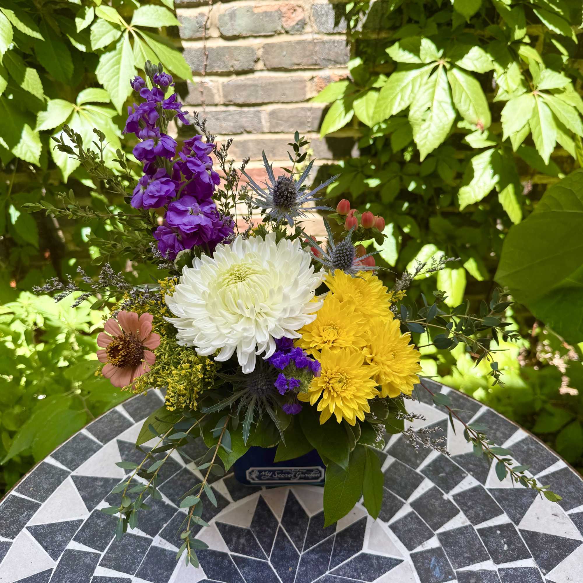 "Brilliant Blossoms" is a beautiful and petite floral design of vibrant flowers, photo 2 of 3