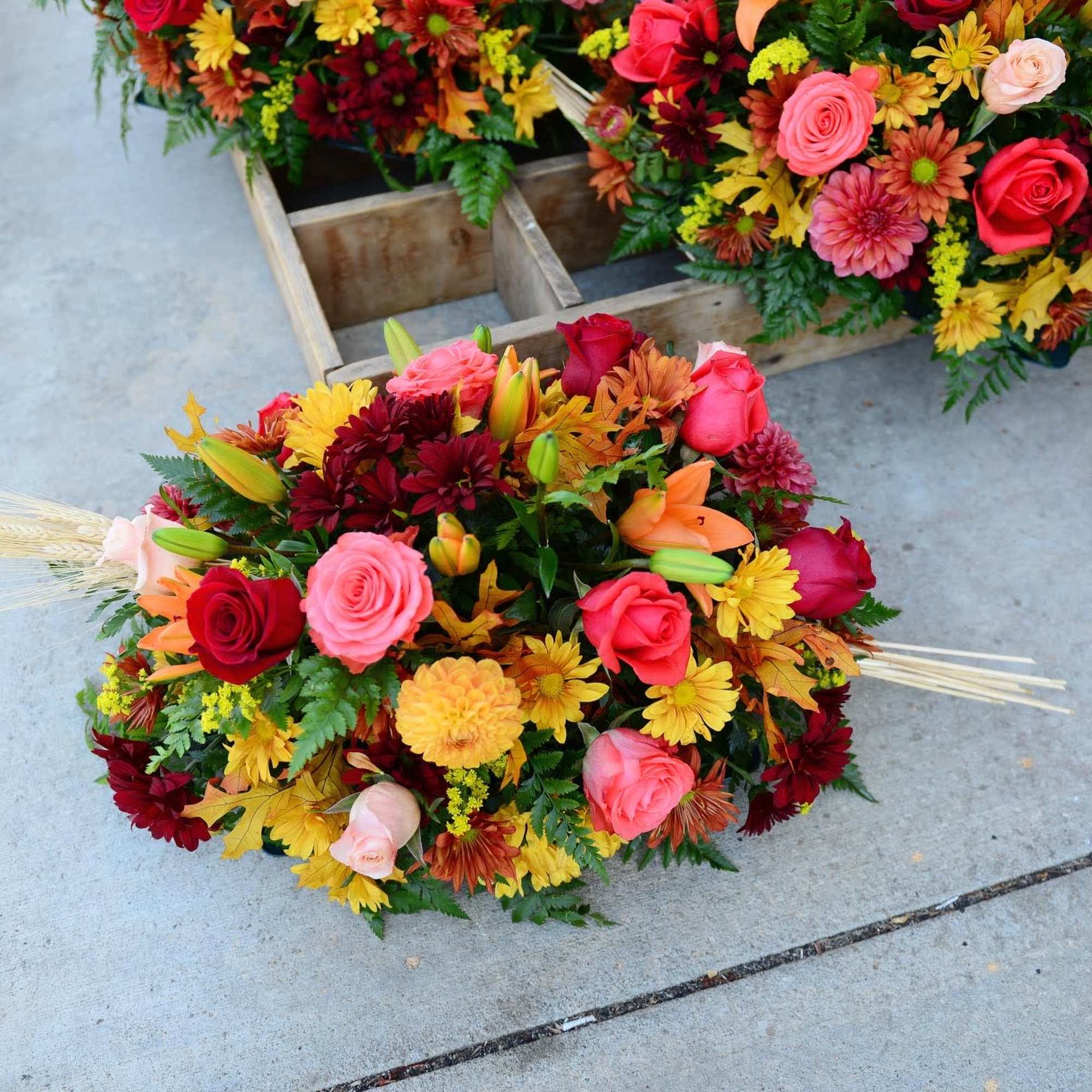 A mix of all favorite flowers like roses, lilies, carnations, daisy, chrysanthemums, photo 2 of 3