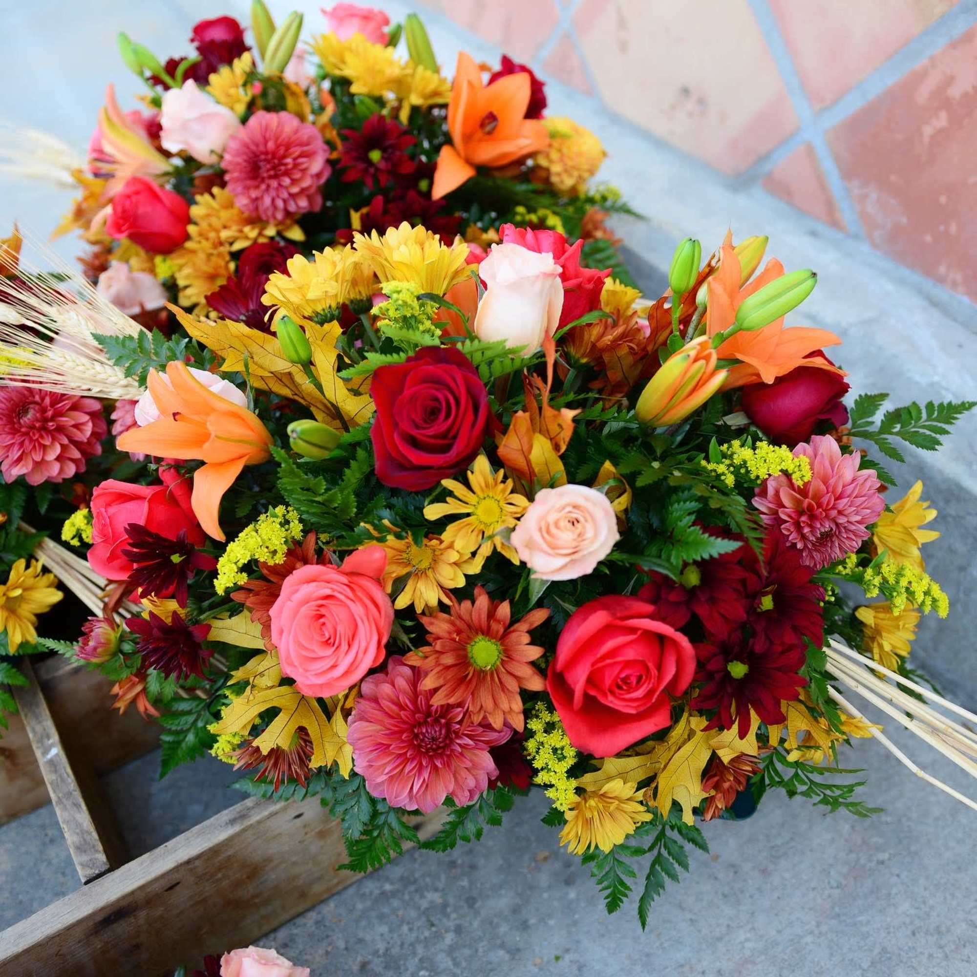 A mix of all favorite flowers like roses, lilies, carnations, daisy, chrysanthemums, photo 3 of 3