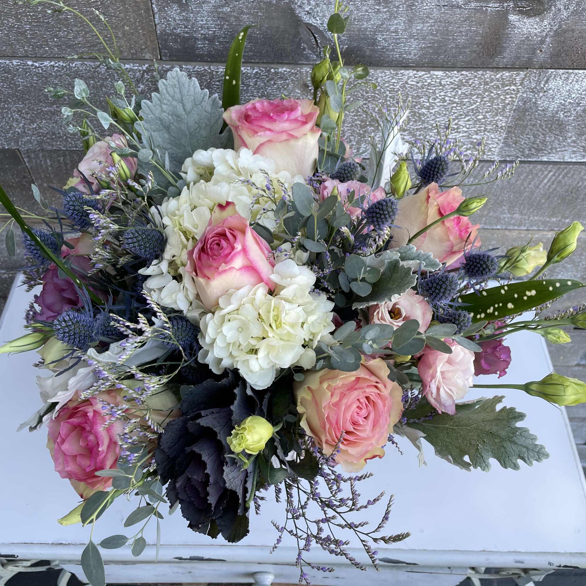 Pink roses and white hydrangeas in a mixed bouquet