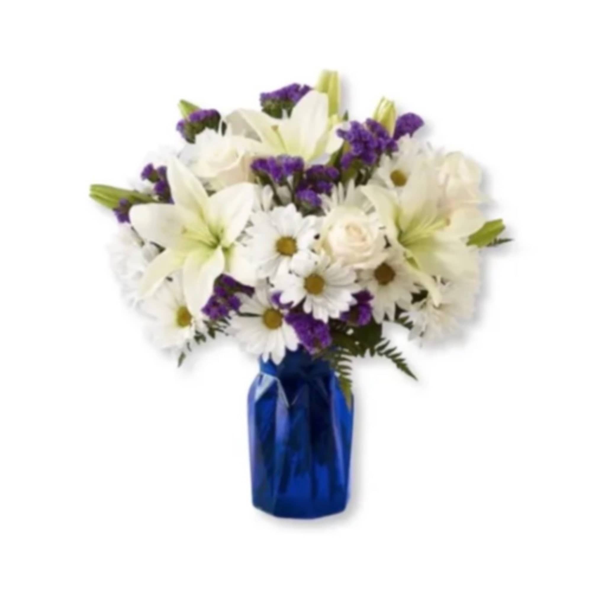 White lilies and daisies with purple accents in a blue vase