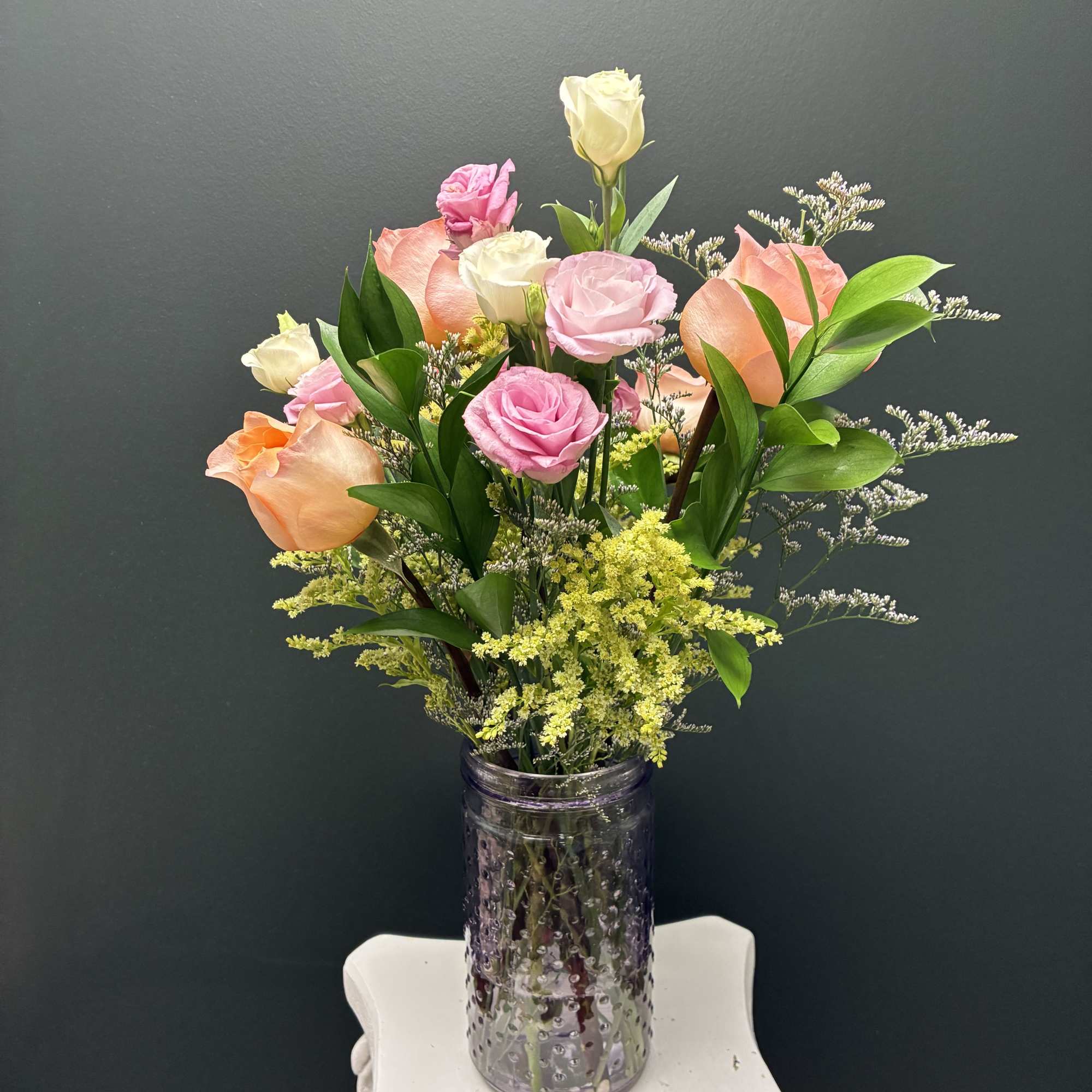 Celebrate their moment on stage with Final Bow Blooms. This hand-tied bundle