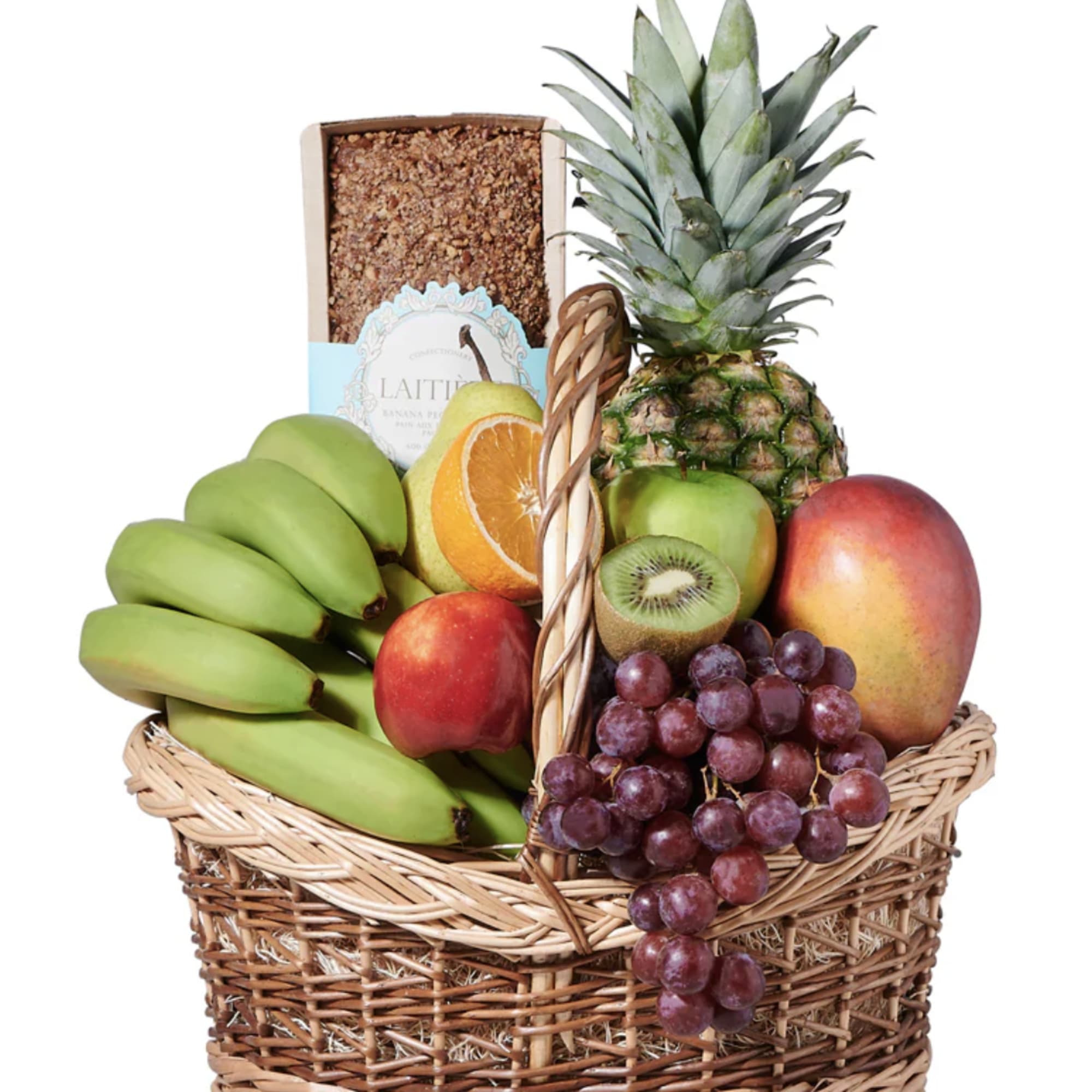 Fruit basket with bananas, pineapple, grapes, mango, apple, kiwi, and citrus