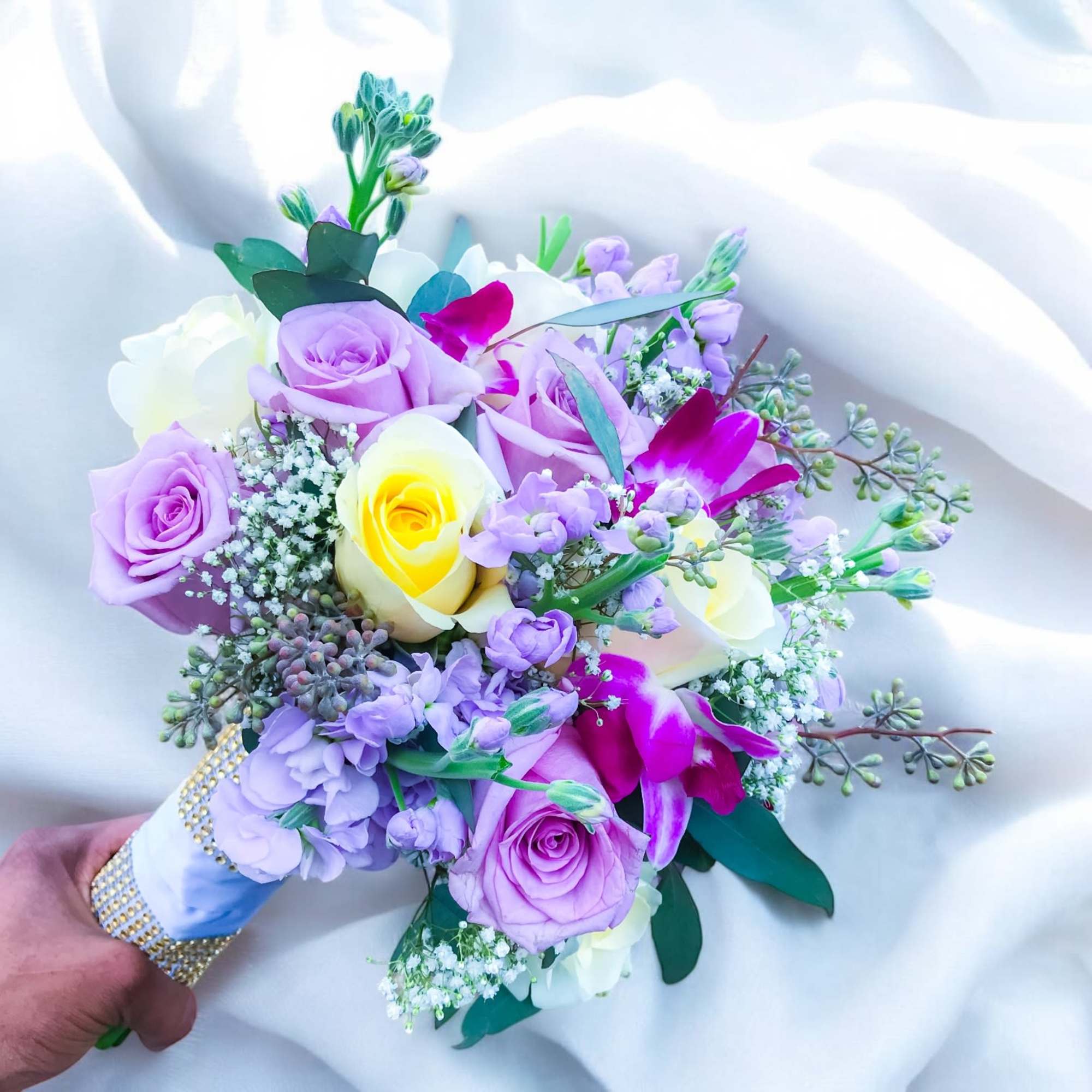 Handheld bouquet of lavender and white roses with purple orchids, photo 3 of 3