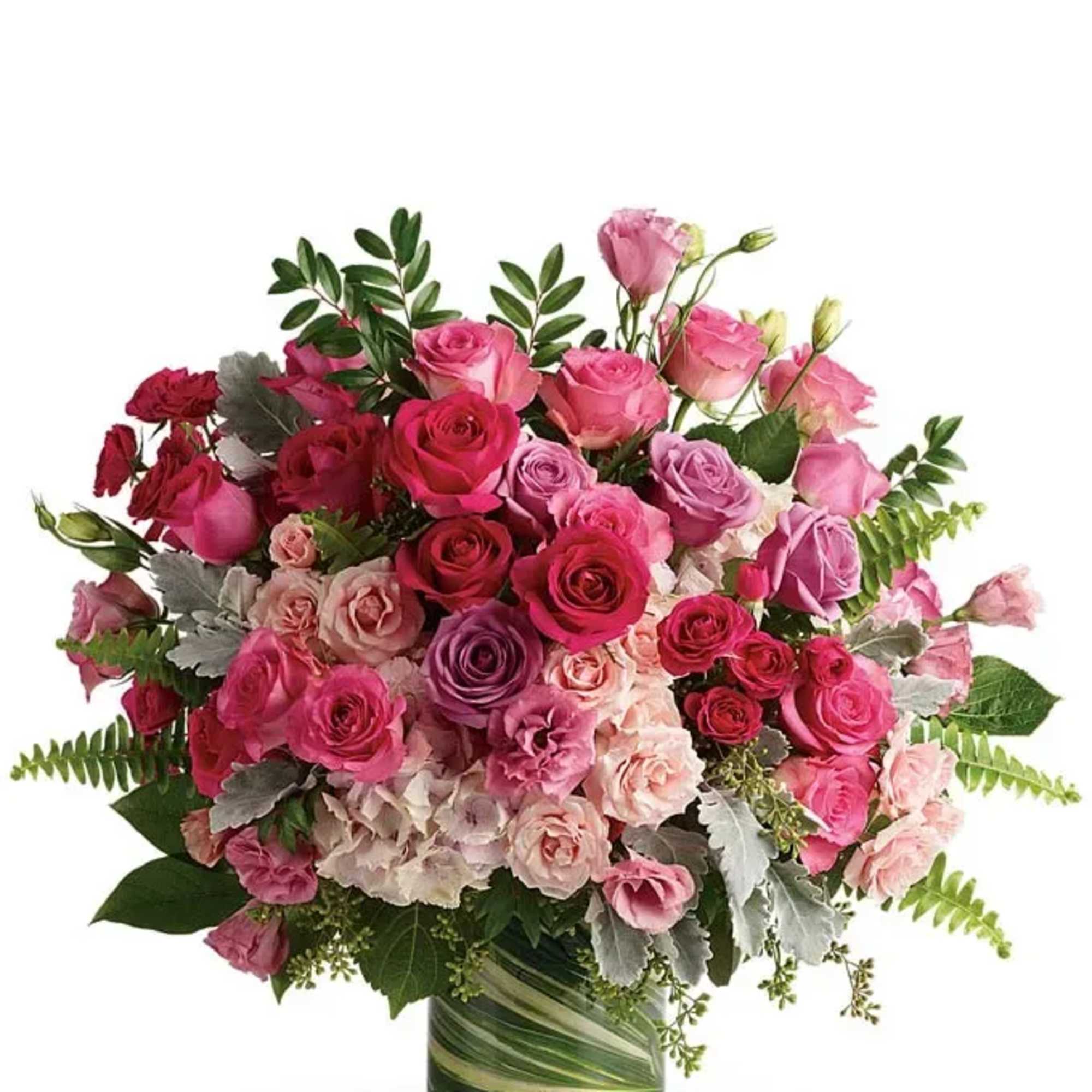 Pink and red rose bouquet in a glass vase