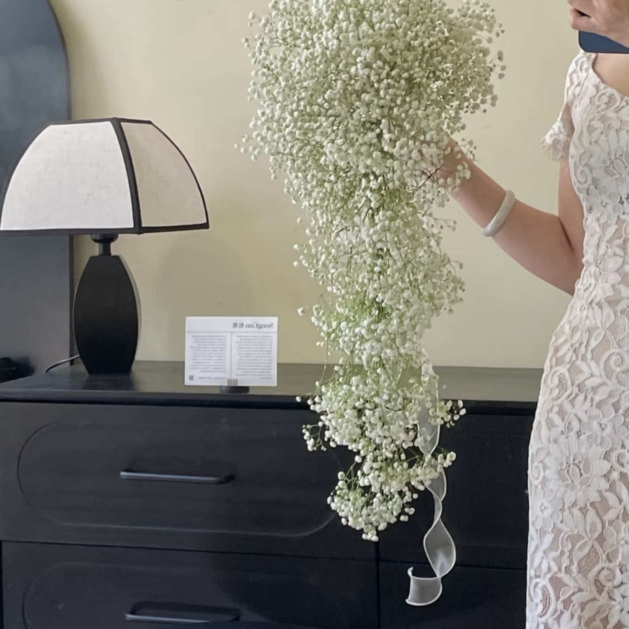 Large cascading bouquet of white baby's breath with a ribbon tail, photo 2 of 4