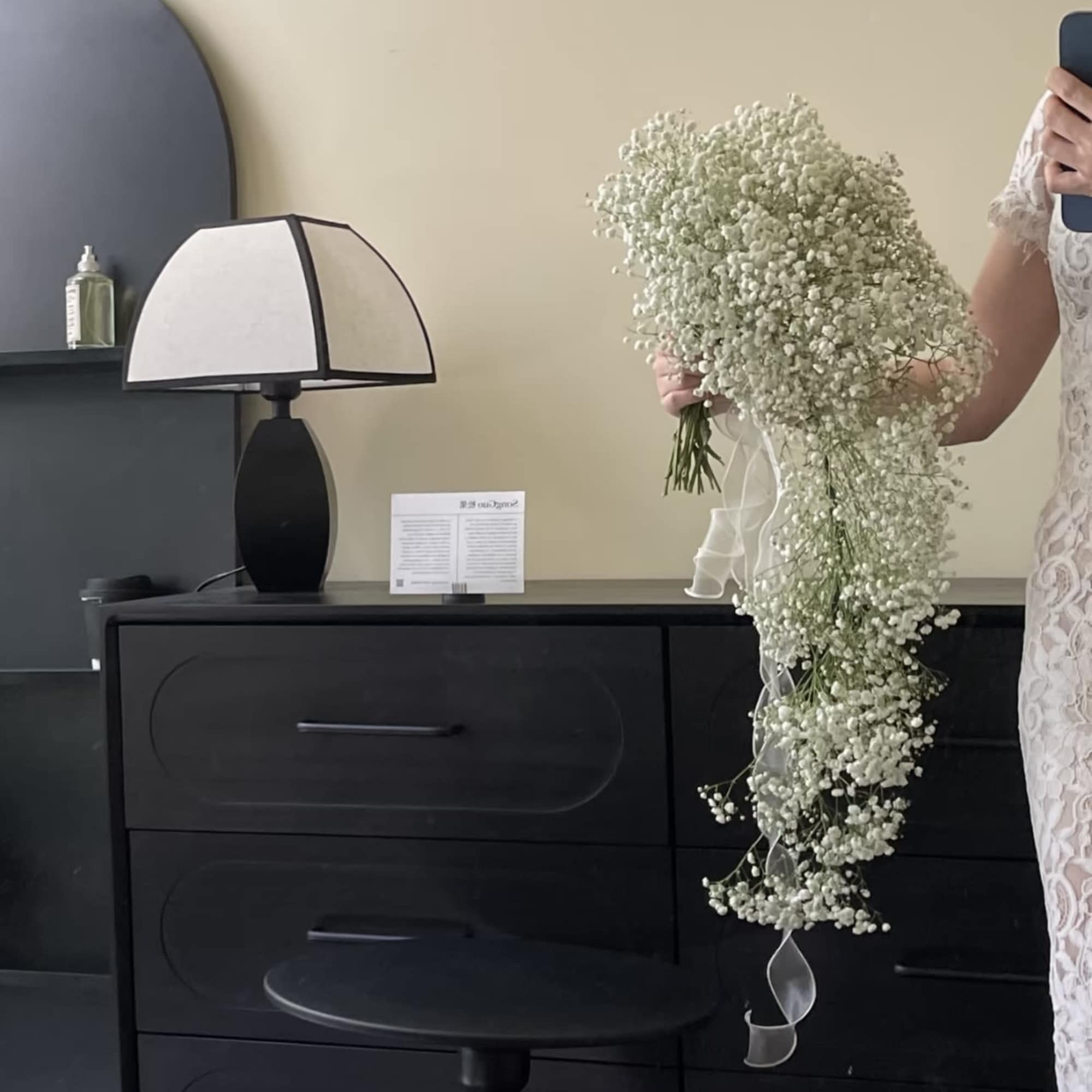 Large cascading bouquet of white baby's breath with a ribbon tail, photo 3 of 4