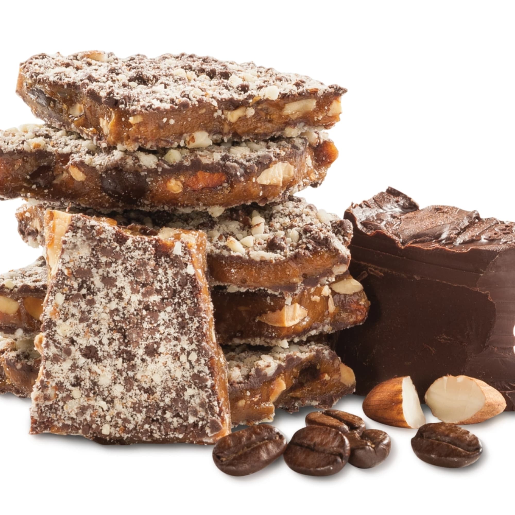 Stacked chocolate nut brittle pieces with coffee beans on a white background