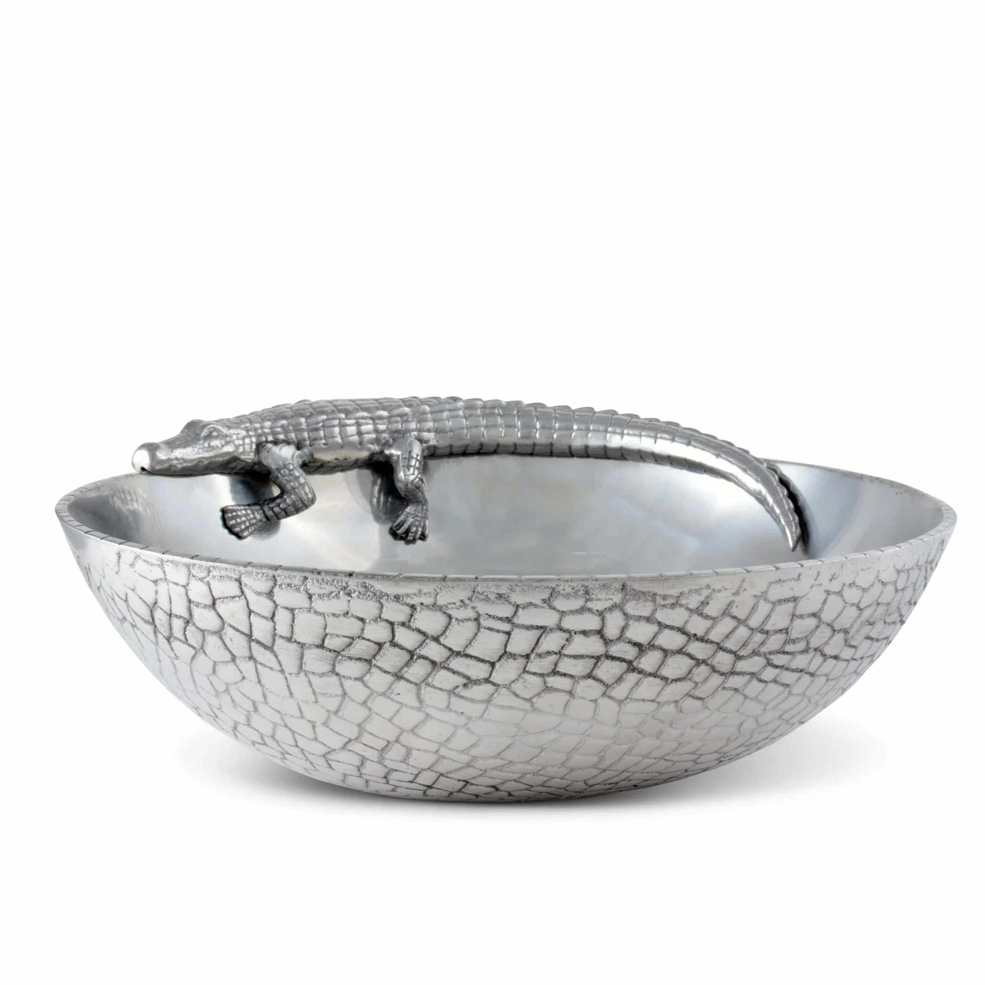 Silver bowl with a crocodile figurine resting on the rim