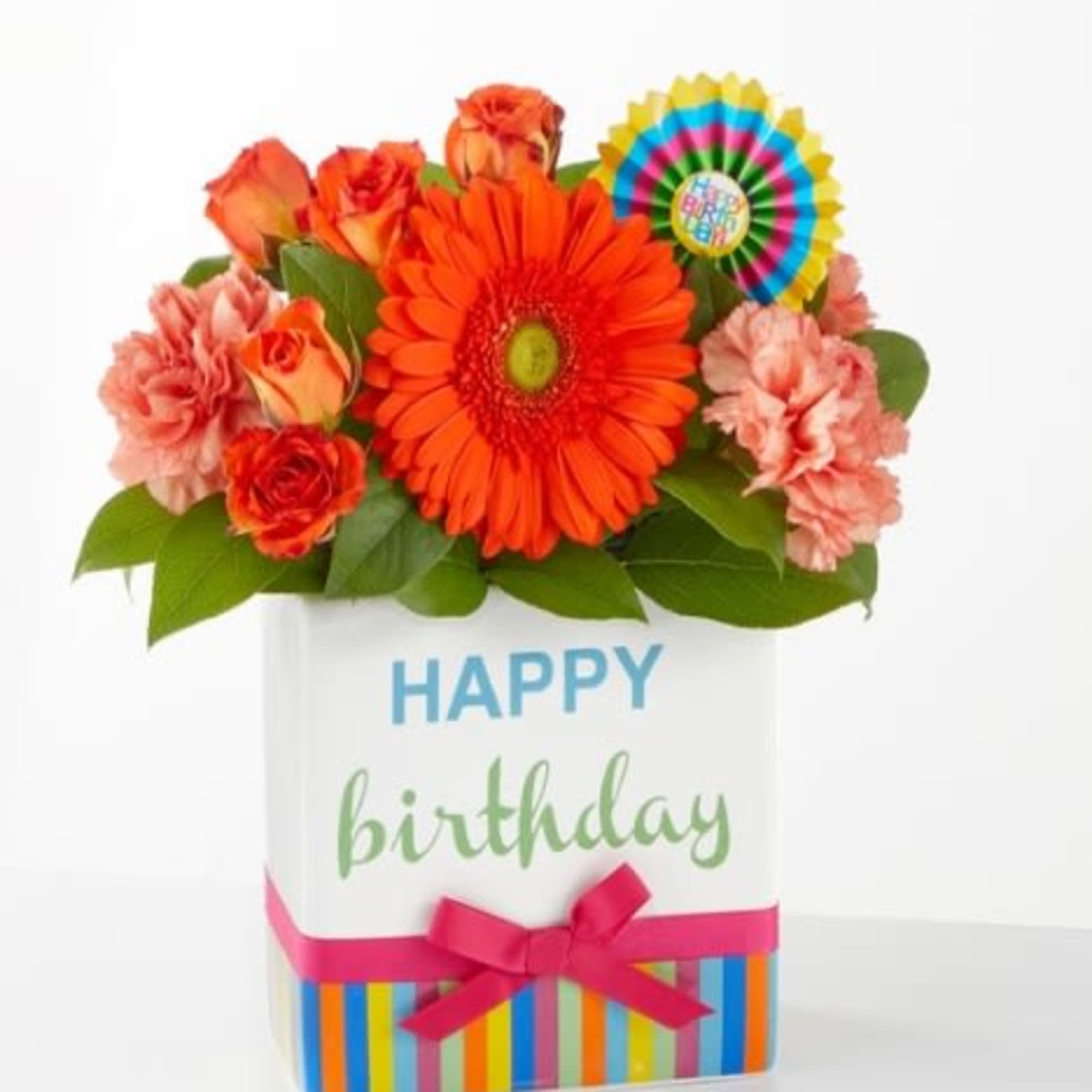 Birthday flower arrangement in a gift box with orange and pink blooms