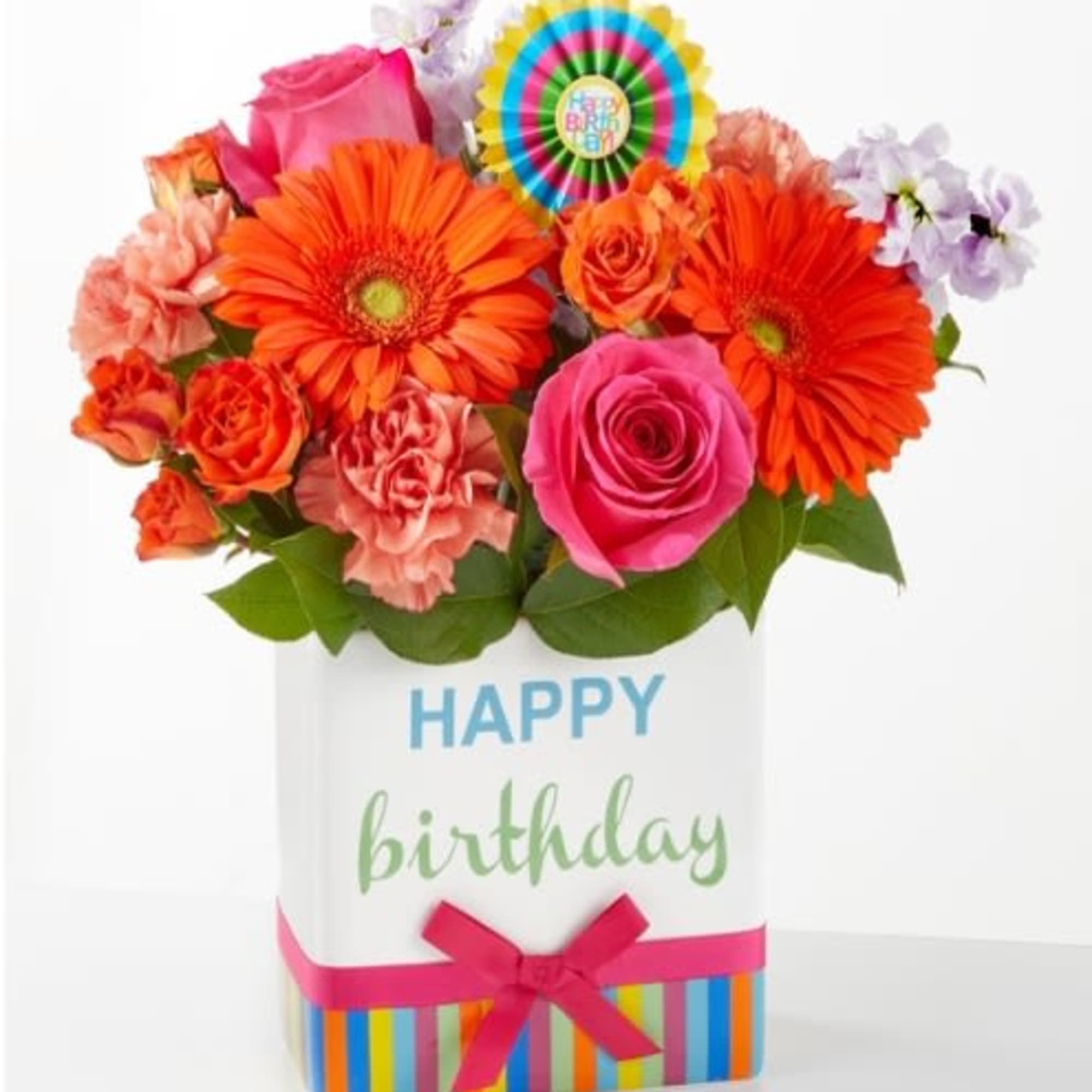 Birthday bouquet in a striped gift box with bright mixed flowers