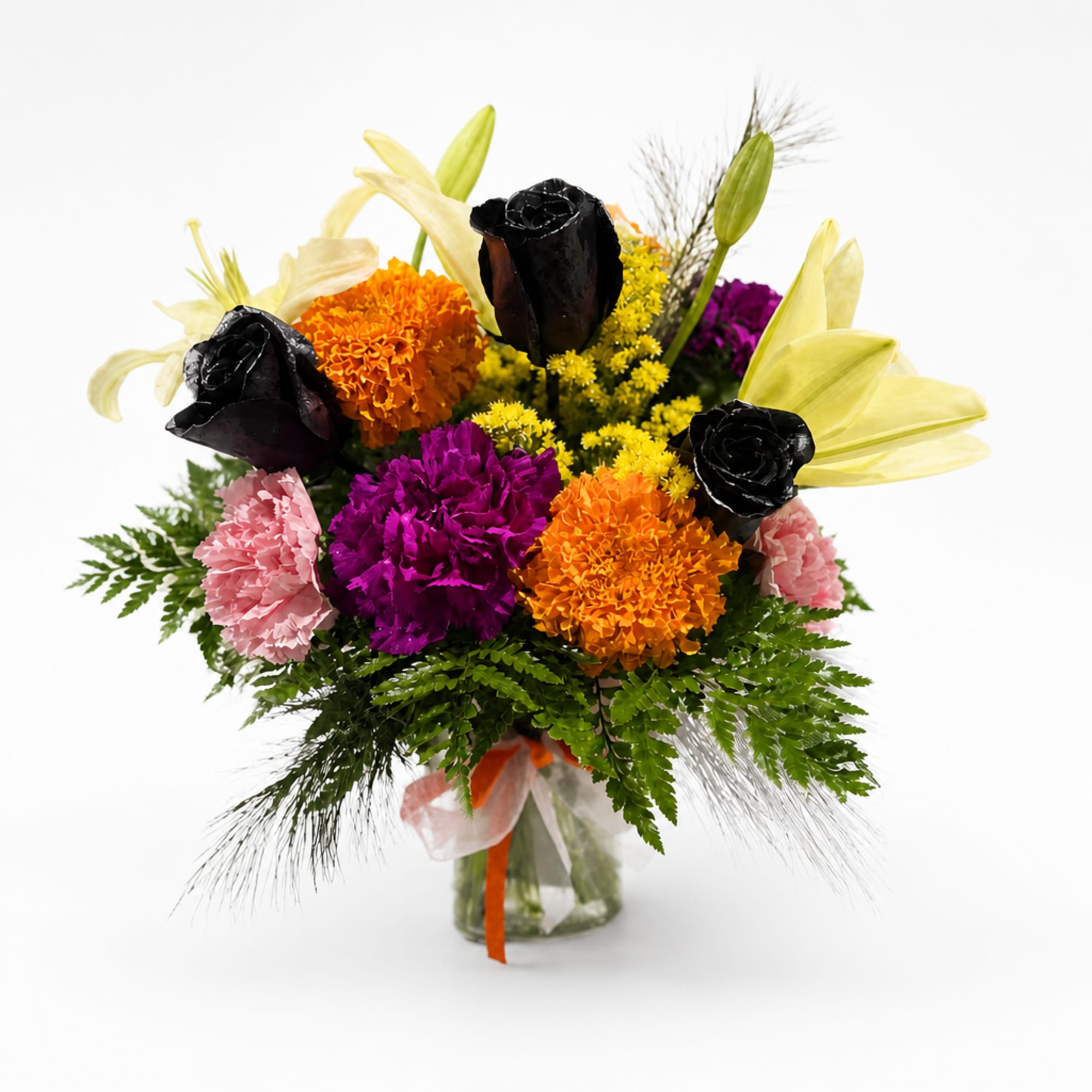 Colorful bouquet with black roses, lilies, and carnations in a glass vase