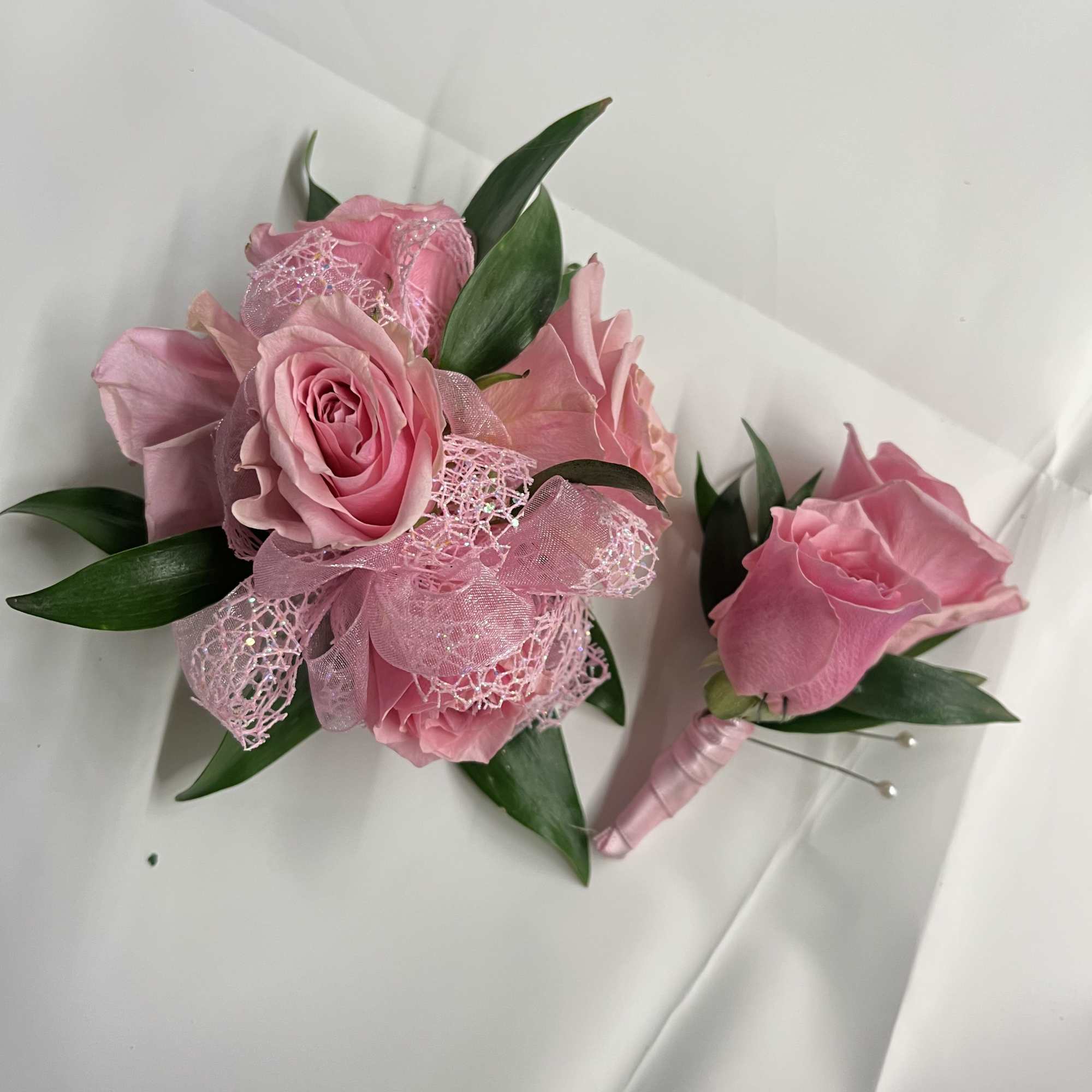 Pink rose corsage and boutonniere set for a soft, romantic look. The, photo 2 of 2